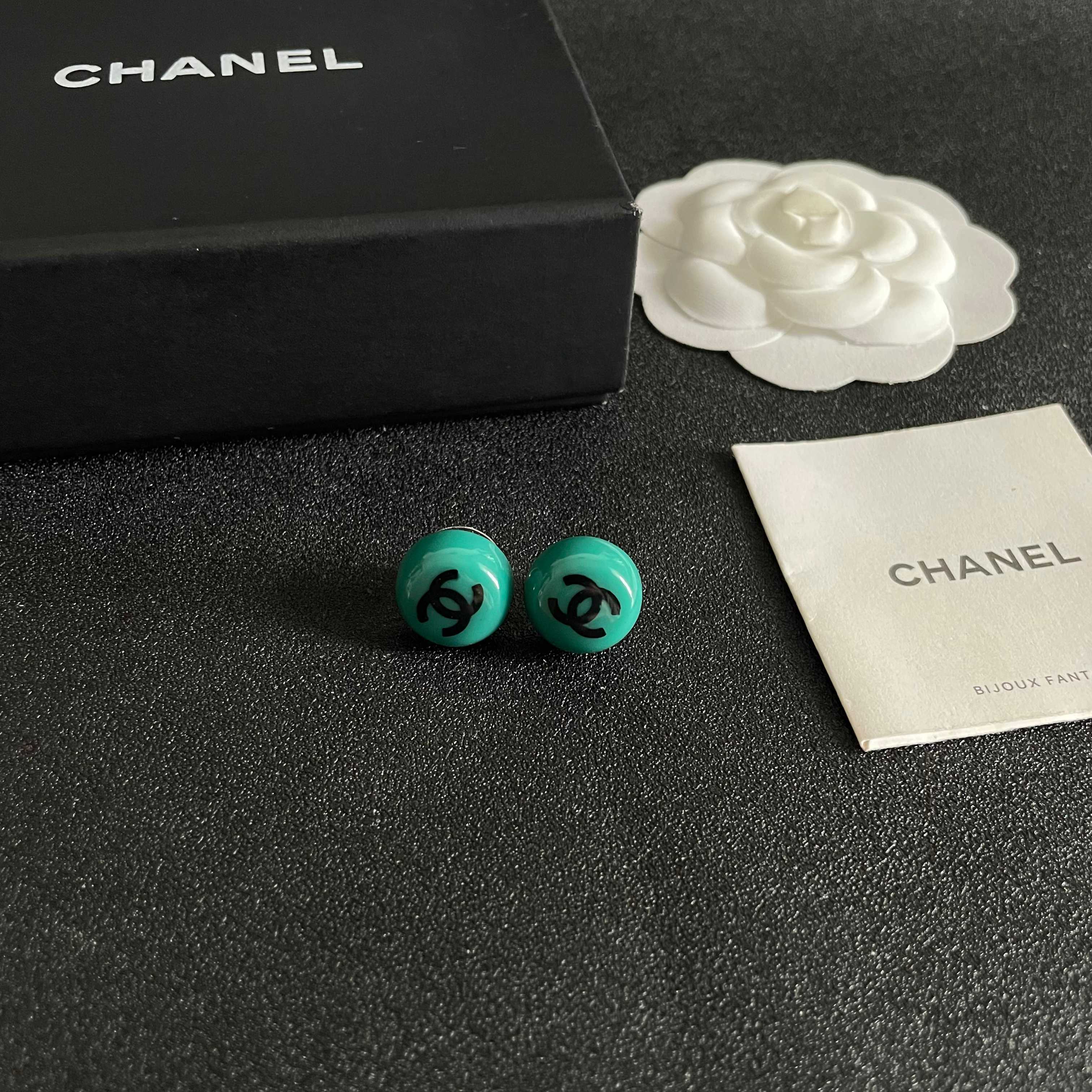 Chanel CC Logo Round Stud Earrings earrings Turquoise resin with black interlocking CC logo silver-toned metal hardware 1 2cm diameter