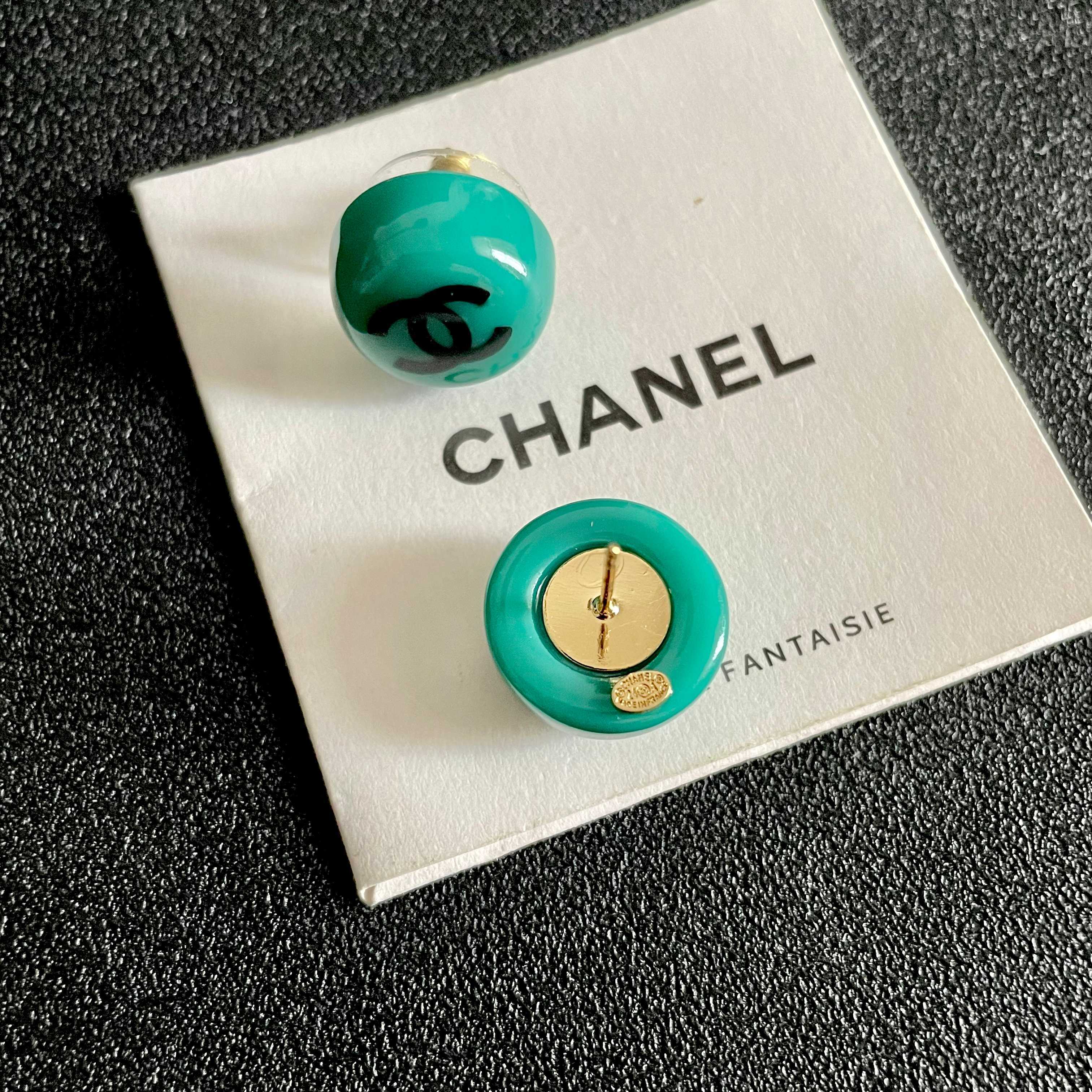Chanel CC Logo Round Stud Earrings earrings Turquoise resin with black interlocking CC logo silver-toned metal hardware 1 2cm diameter