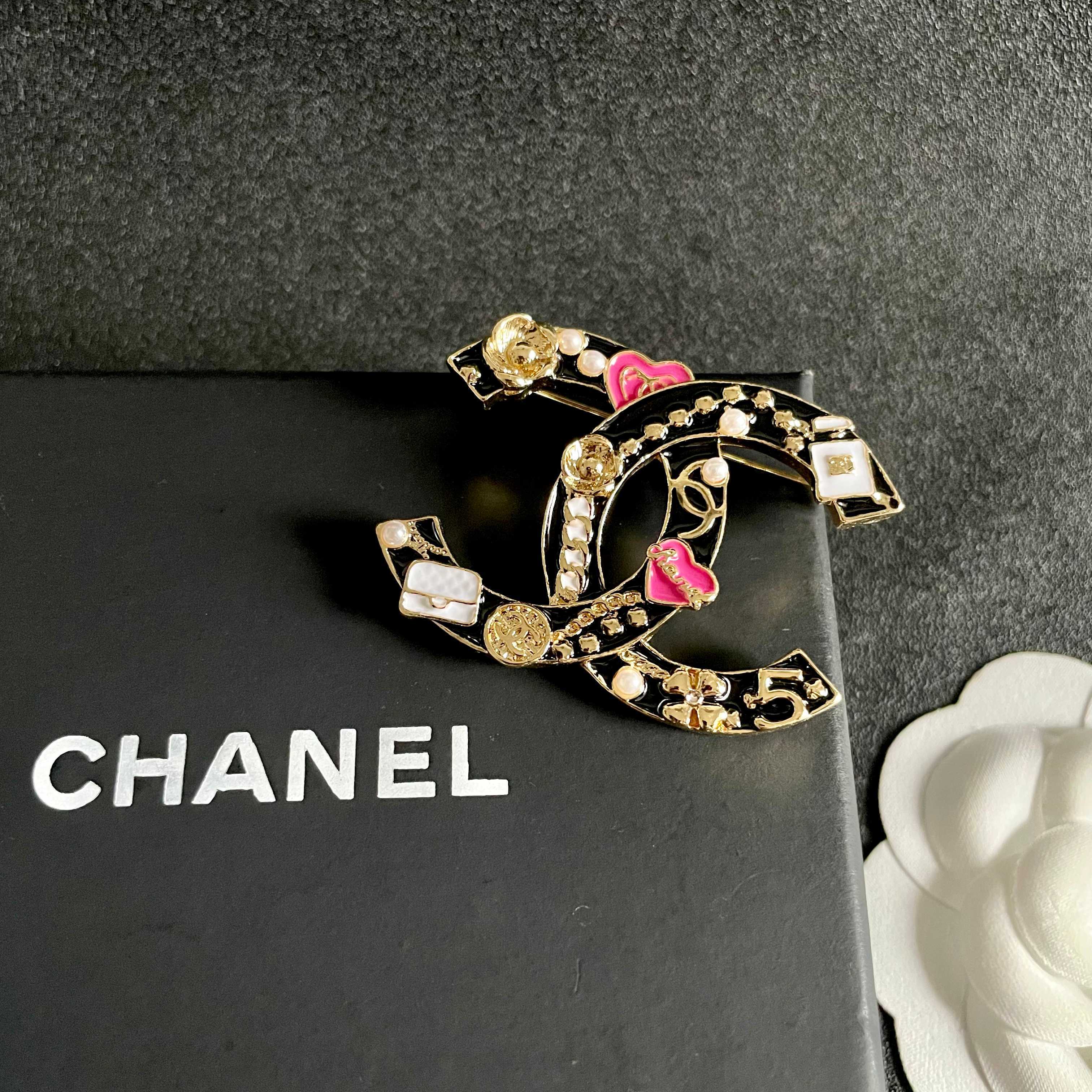 Chanel CC Logo Heart Charms Brooch brooch gold tone metal with black enamel pink enamel hearts white enamel bag charms white faux pearls 3 5cm width