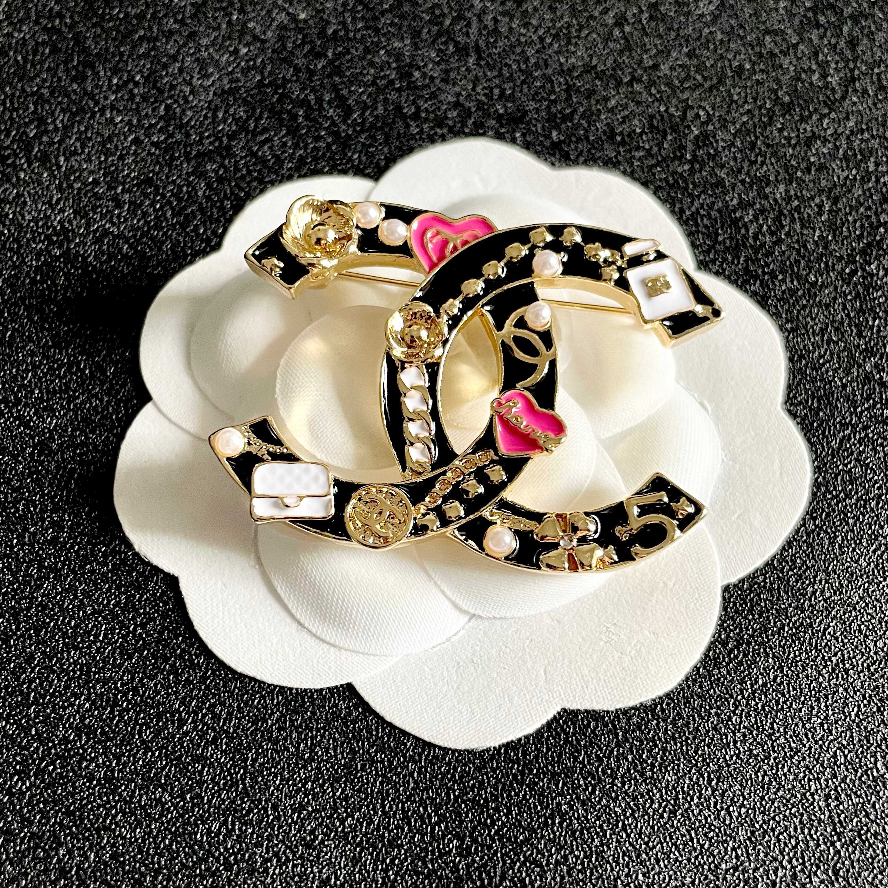 Chanel CC Logo Heart Charms Brooch brooch gold tone metal with black enamel pink enamel hearts white enamel bag charms white faux pearls 3 5cm width