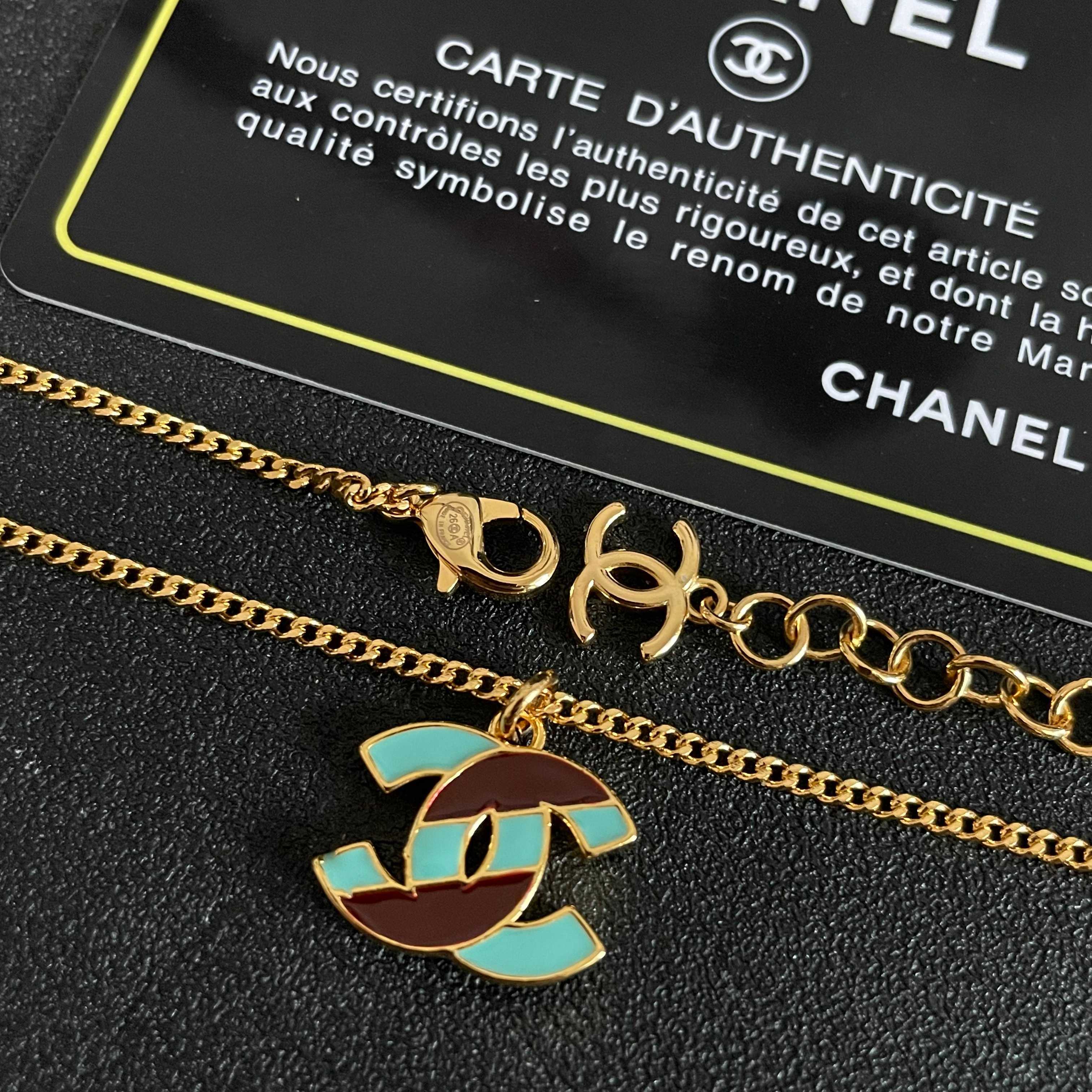 Chanel CC Logo Enamel necklace gold-tone metal with turquoise and burgundy enamel 42cm