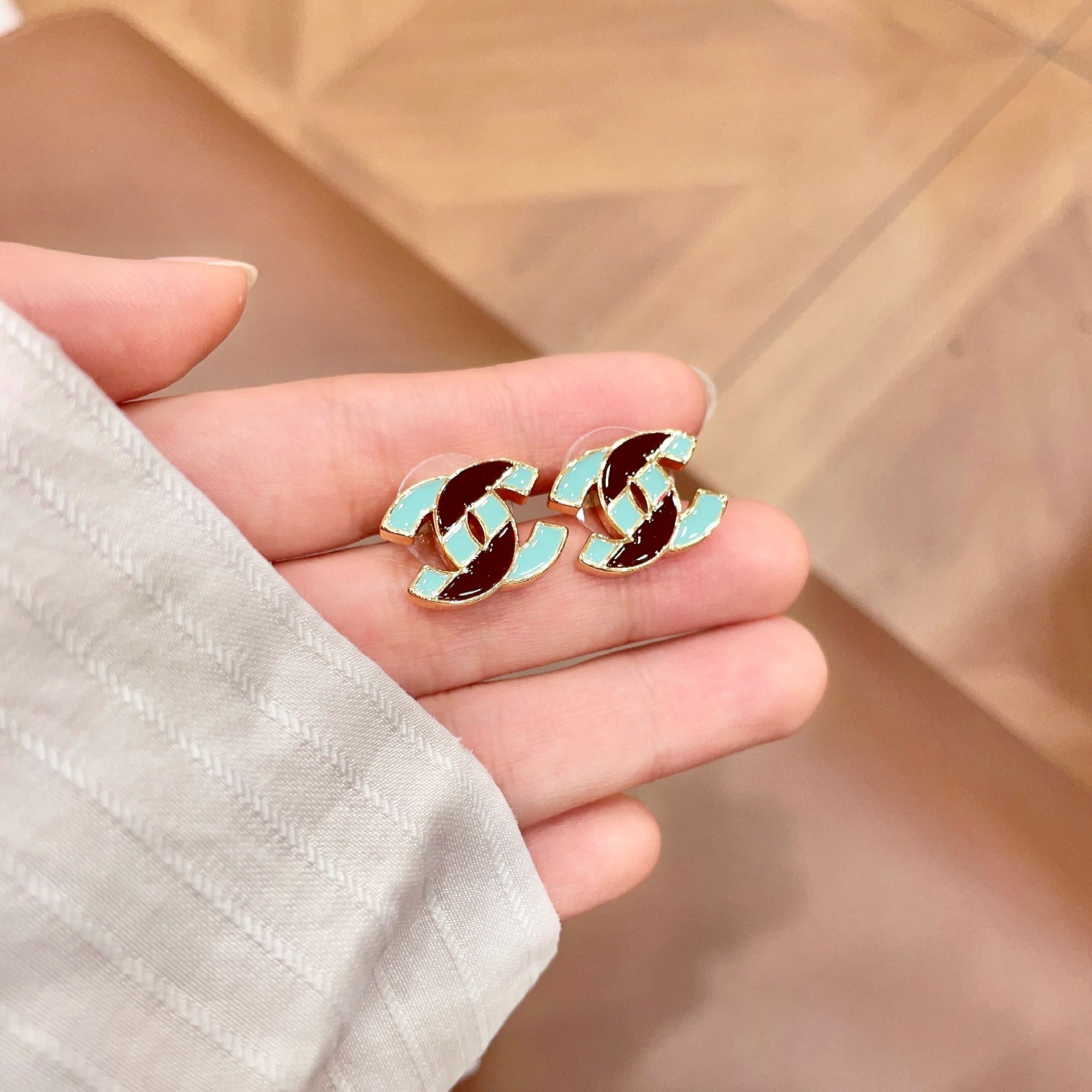 Chanel CC Logo Stud Earrings earrings gold-tone metal with turquoise and brown enamel 1 2cm stud diameter