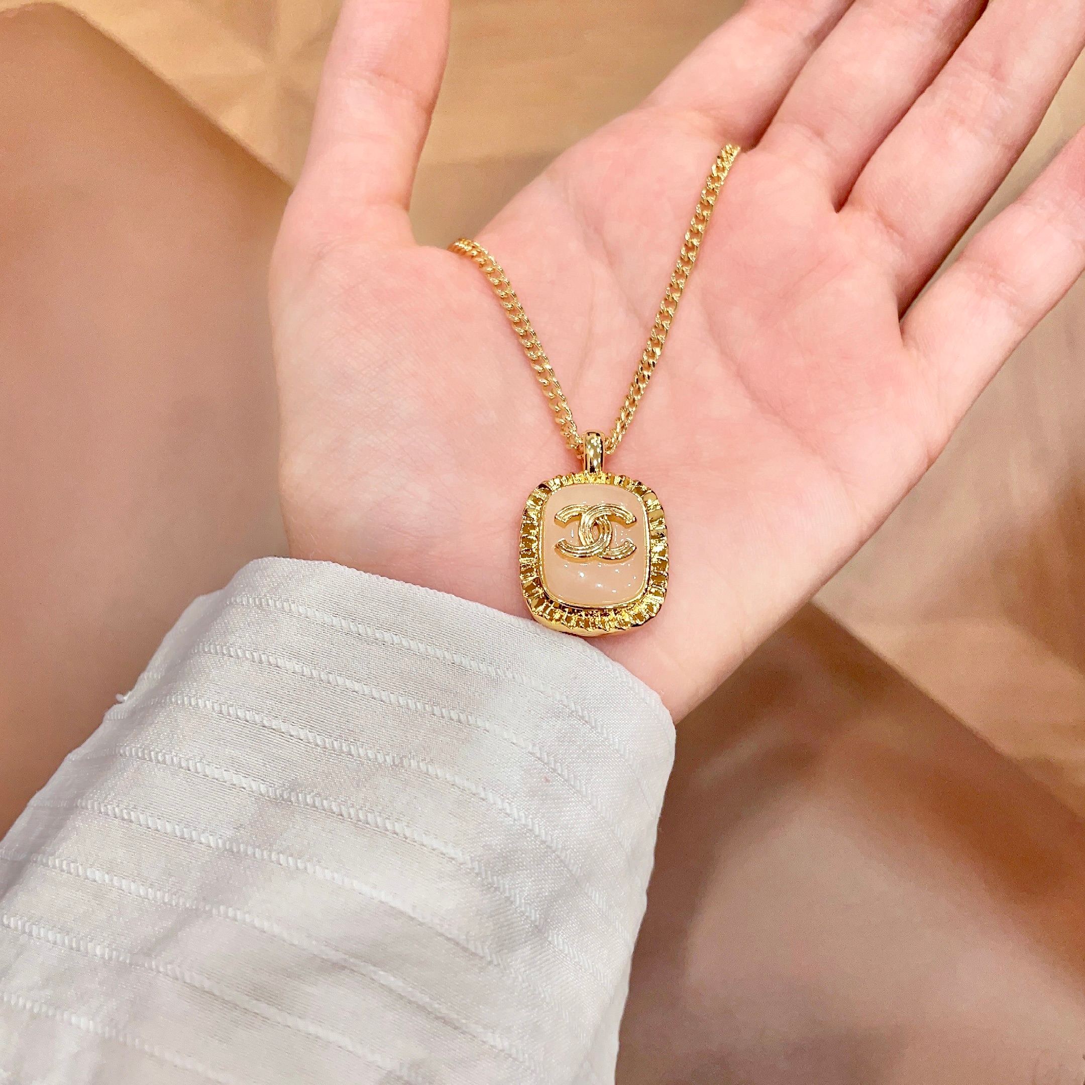 Chanel CC Logo Resin Square Pendant necklace Gold-tone metal with light pink resin 45cm