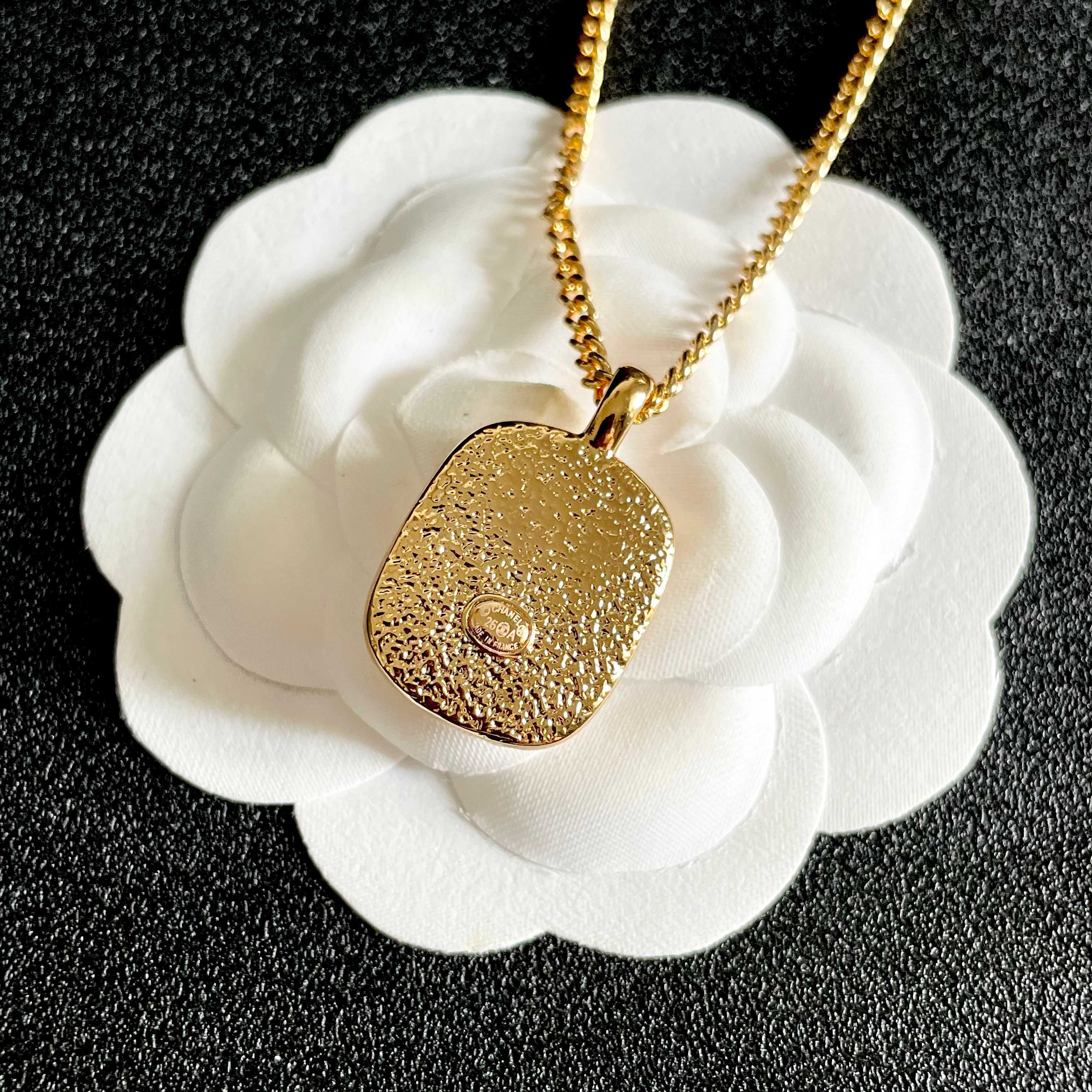 Chanel CC Logo Resin Square Pendant necklace Gold-tone metal with light pink resin 45cm