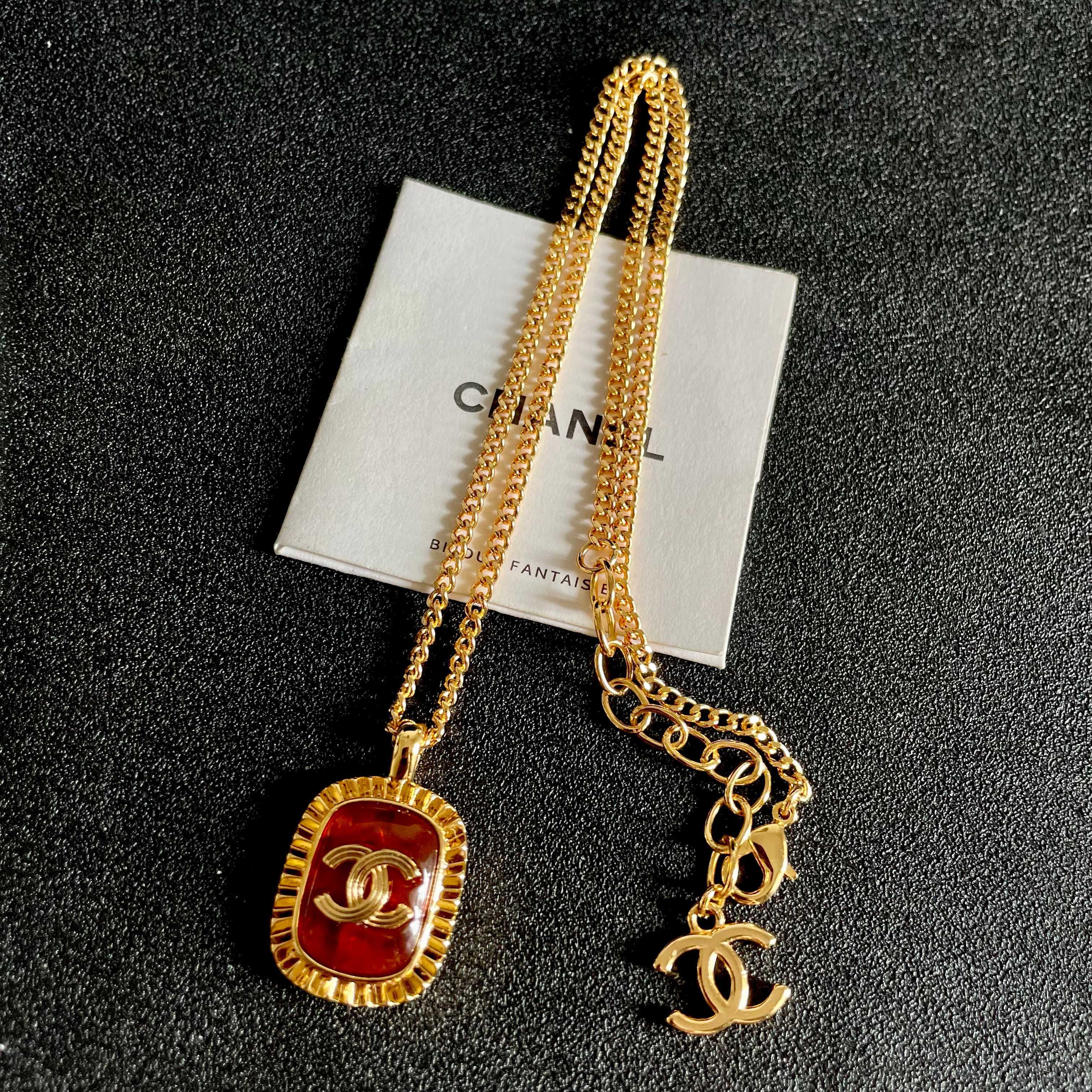Chanel CC Logo Amber Resin Pendant necklace Gold-tone metal with amber orange resin 45cm