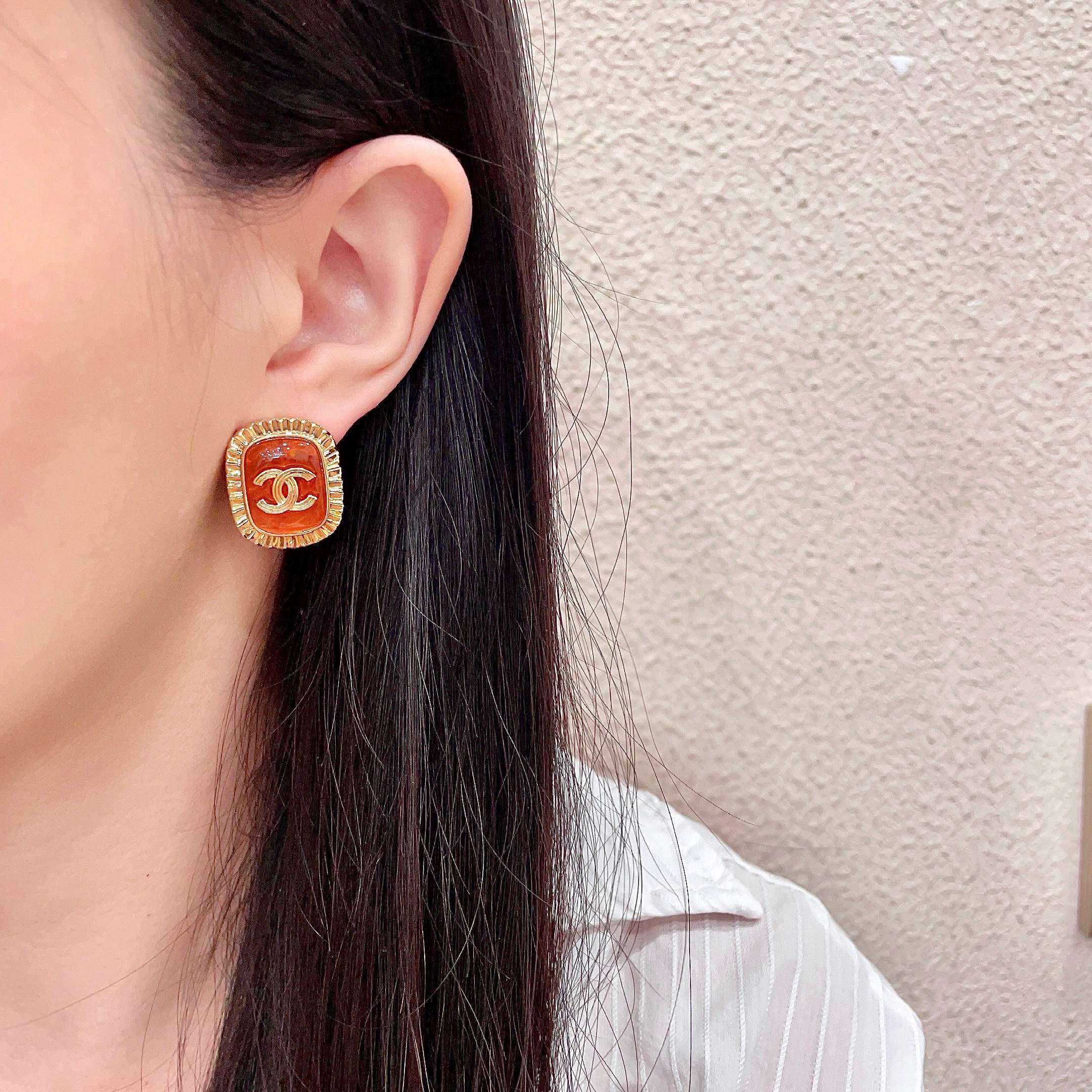 Chanel CC Logo Ribbed Edge Resin Stud Earrings earrings gold-tone metal orange resin 2cm diameter