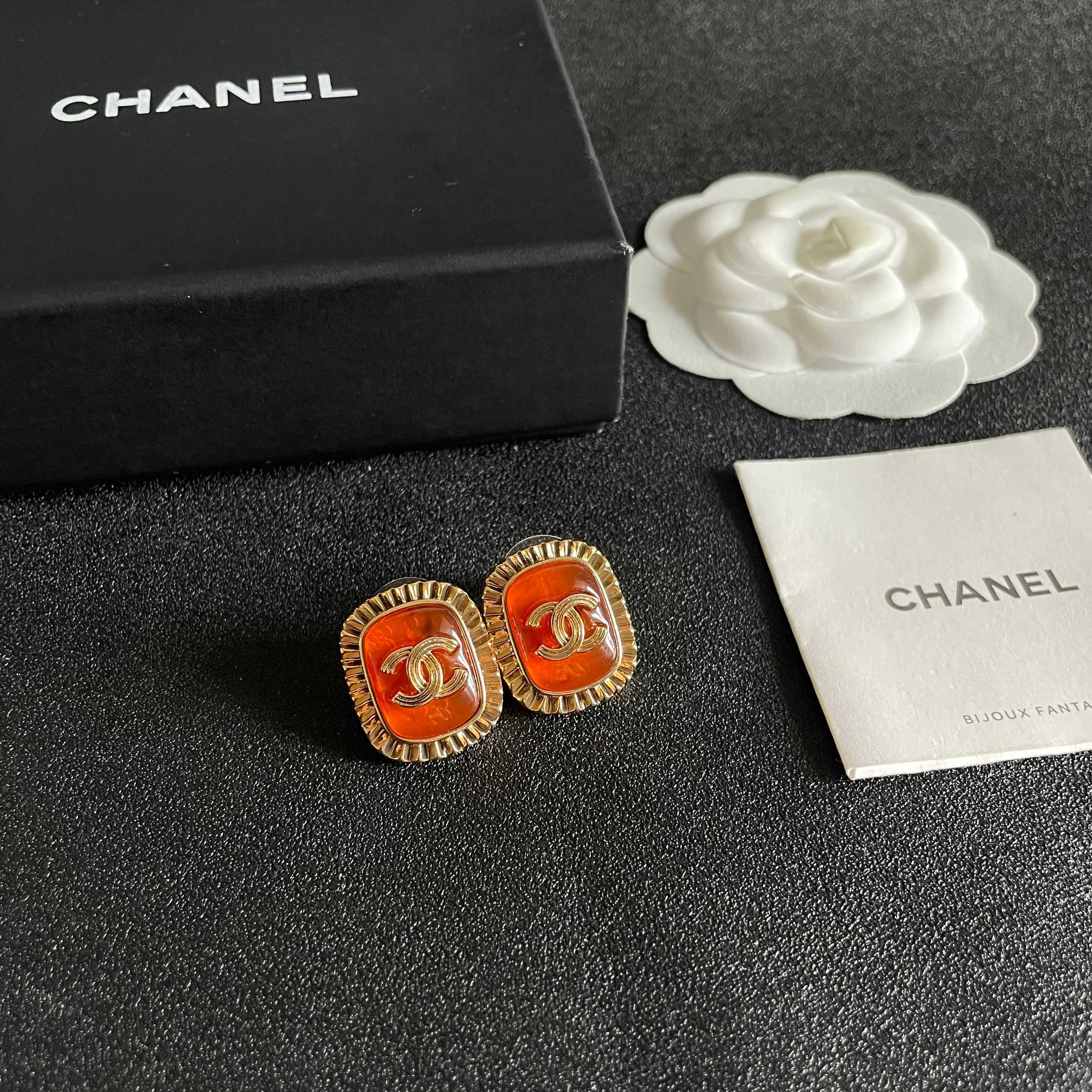 Chanel CC Logo Ribbed Edge Resin Stud Earrings earrings gold-tone metal orange resin 2cm diameter
