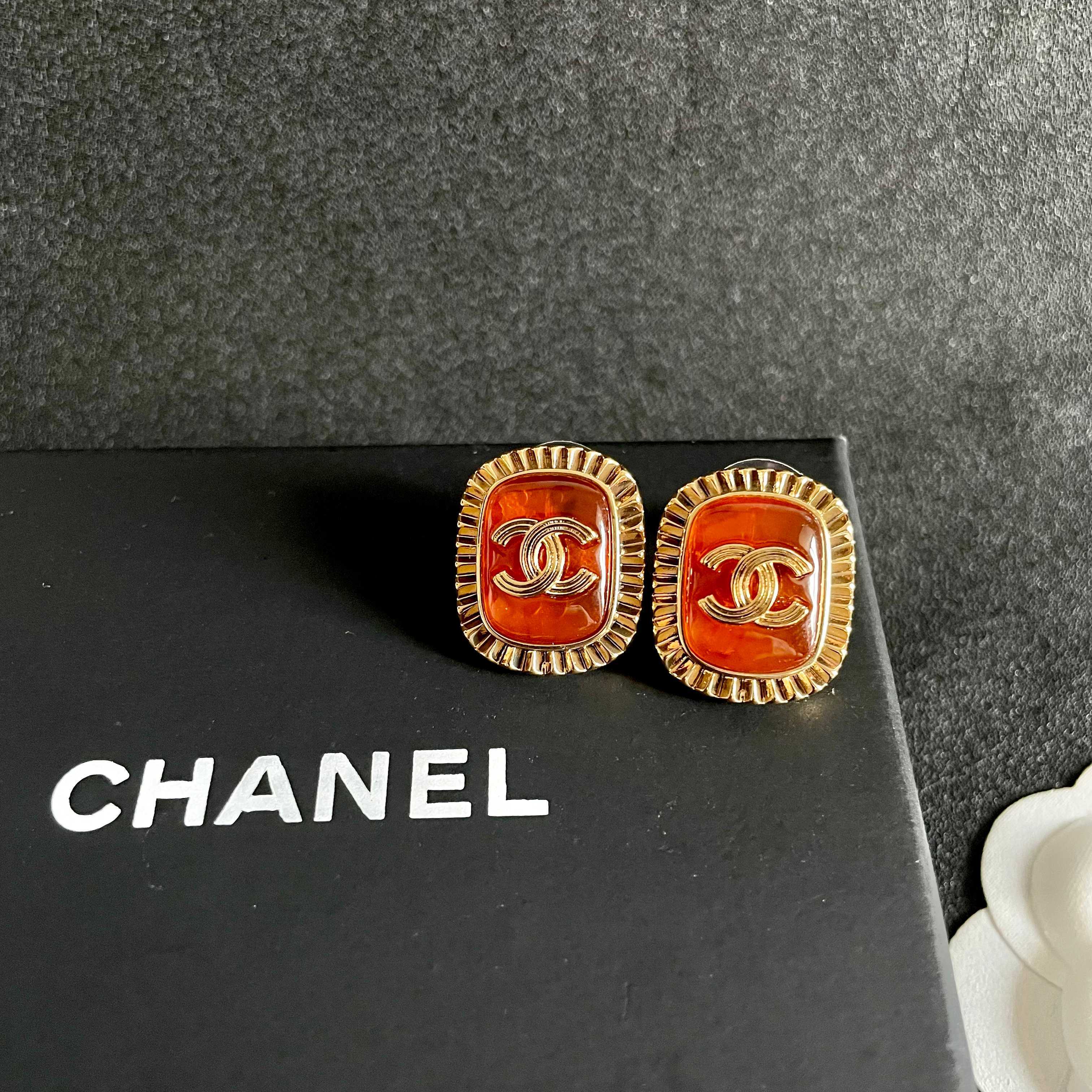 Chanel CC Logo Ribbed Edge Resin Stud Earrings earrings gold-tone metal orange resin 2cm diameter