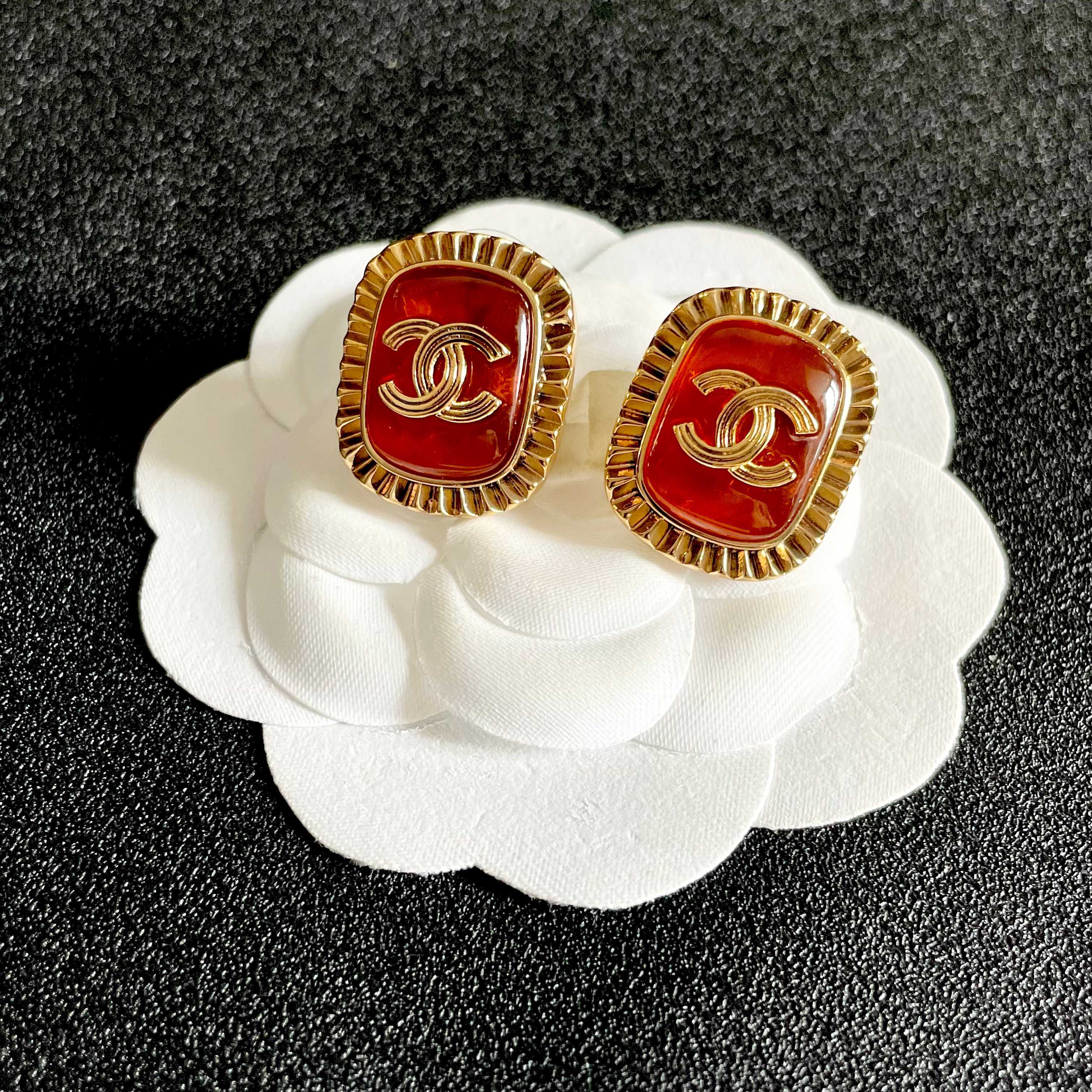 Chanel CC Logo Ribbed Edge Resin Stud Earrings earrings gold-tone metal orange resin 2cm diameter