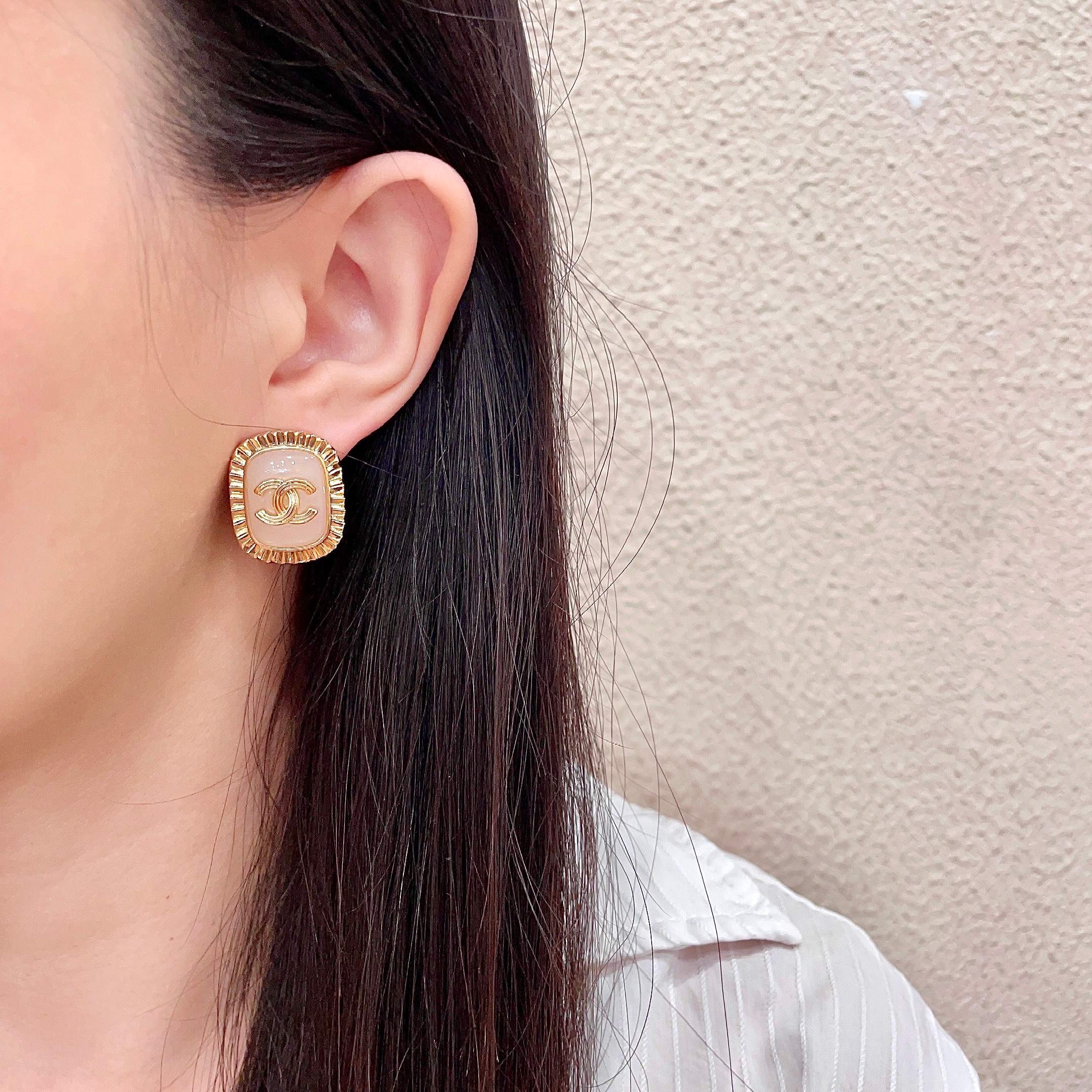 Chanel CC Logo Ribbed Edge Resin Stud Earrings earrings gold-tone metal light pink resin 2cm diameter