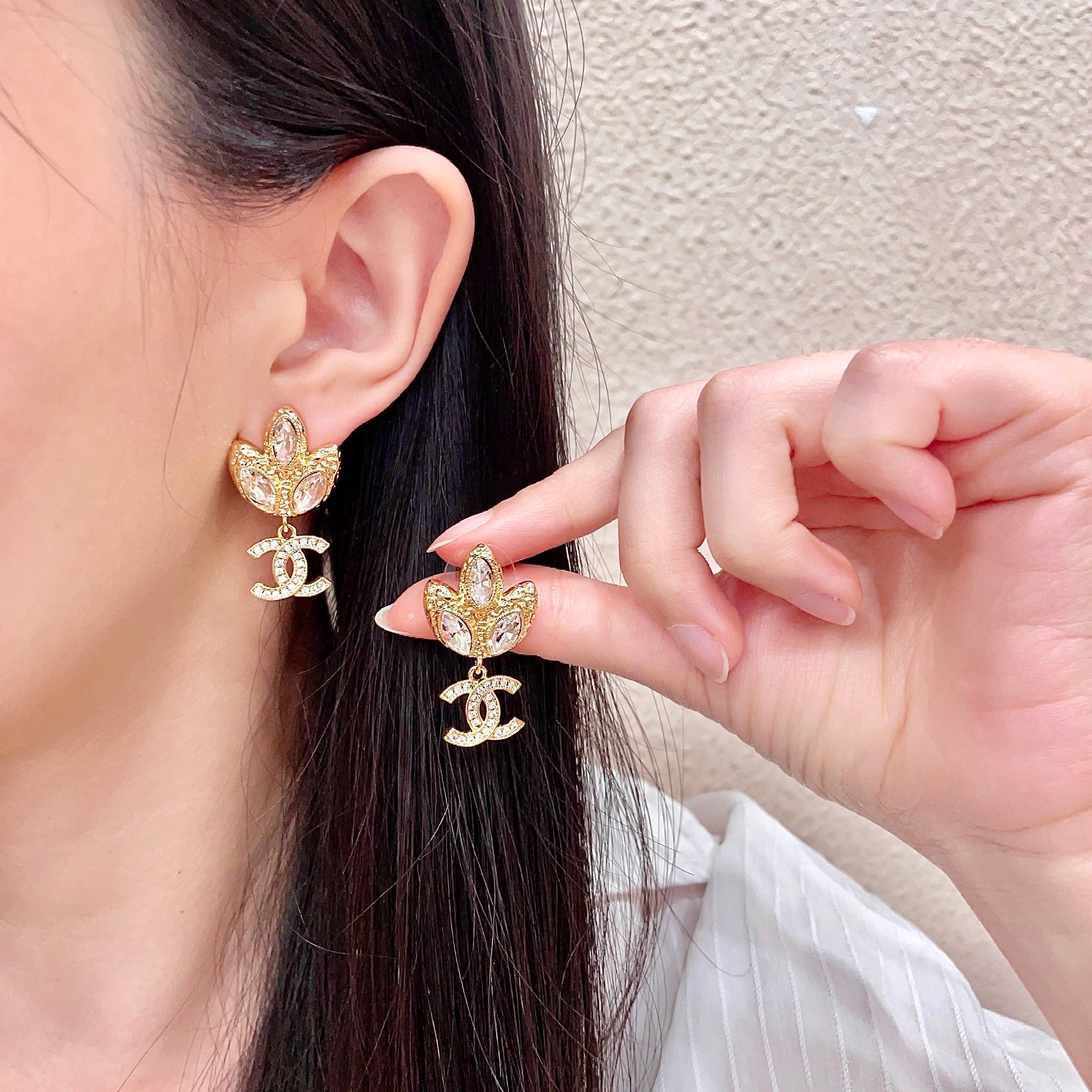 Chanel CC Logo Tulip Crystal Drop Earrings earrings gold-tone metal with clear faceted crystals 2 5cm drop length