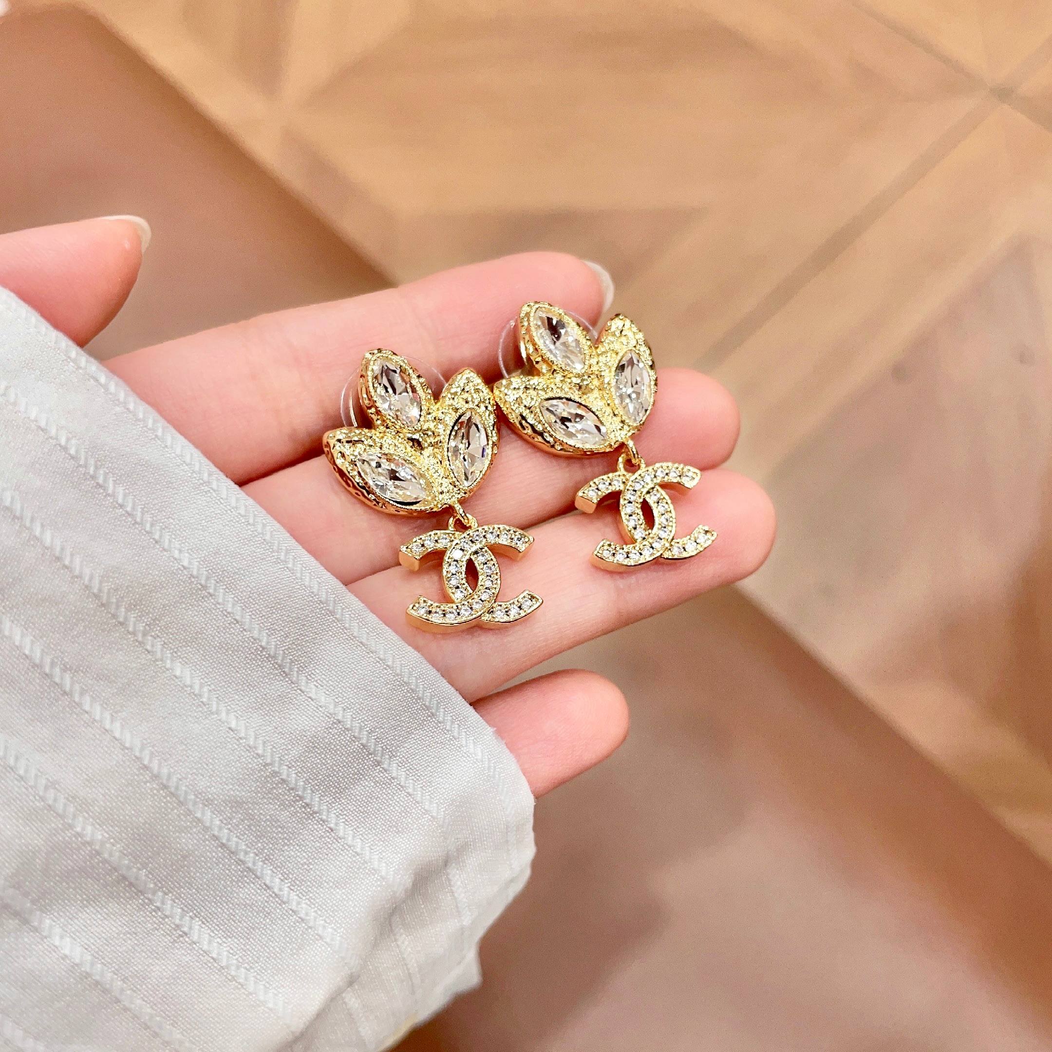 Chanel CC Logo Tulip Crystal Drop Earrings earrings gold-tone metal with clear faceted crystals 2 5cm drop length