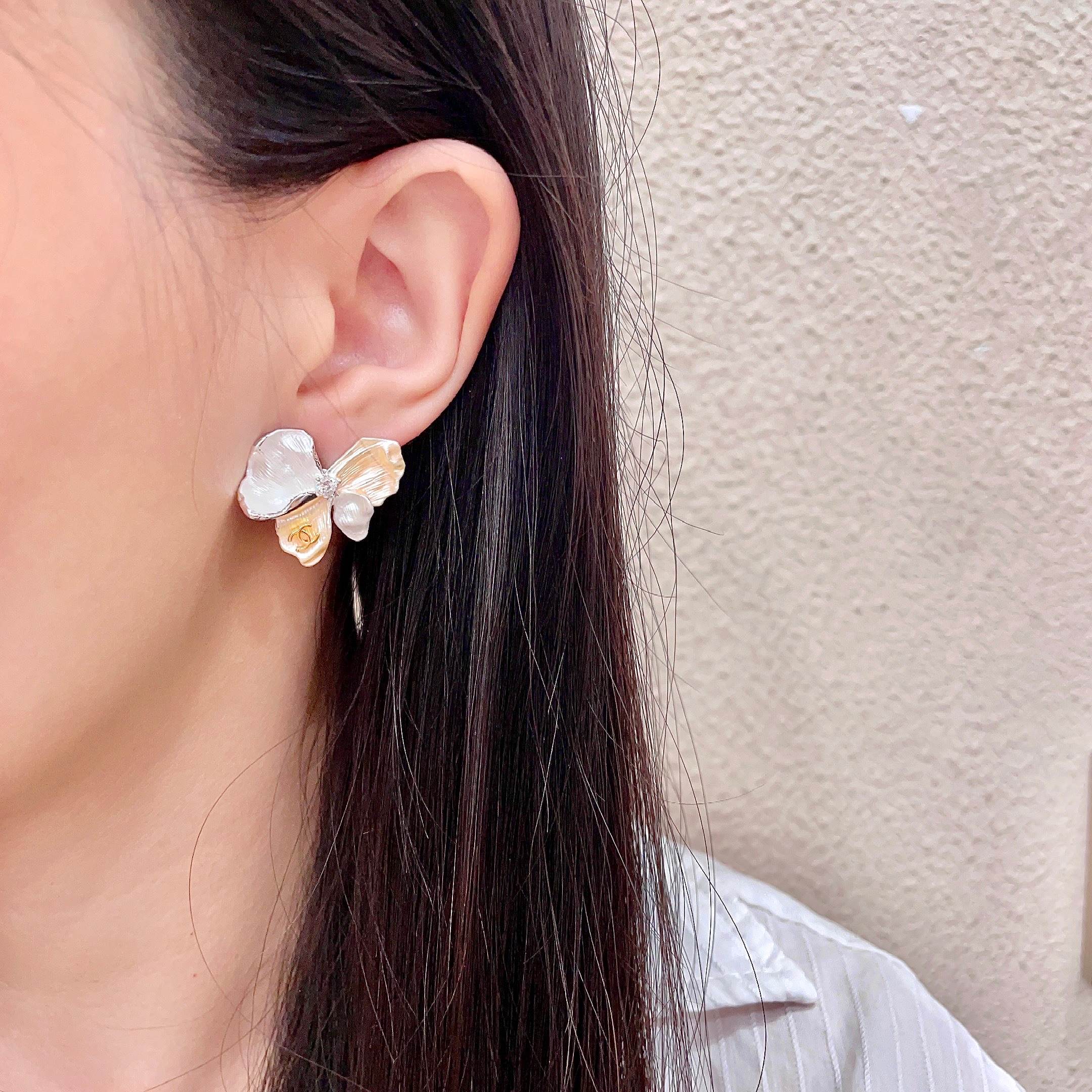 Chanel CC Logo Two-Tone Flower Stud Earrings earrings Two-tone silver and gold metal white mother-of-pearl effect clear crystal accent 2cm stud diameter