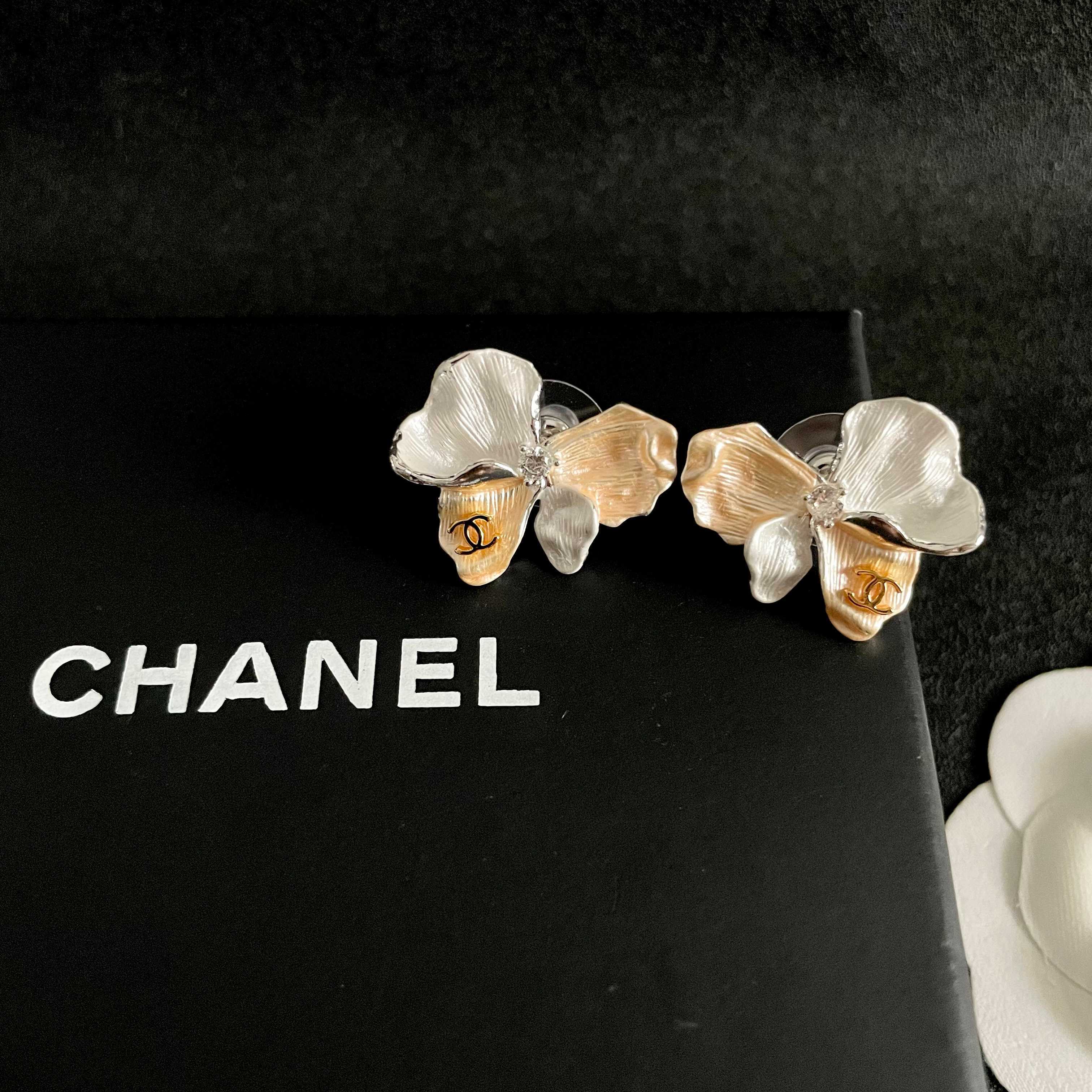Chanel CC Logo Two-Tone Flower Stud Earrings earrings Two-tone silver and gold metal white mother-of-pearl effect clear crystal accent 2cm stud diameter