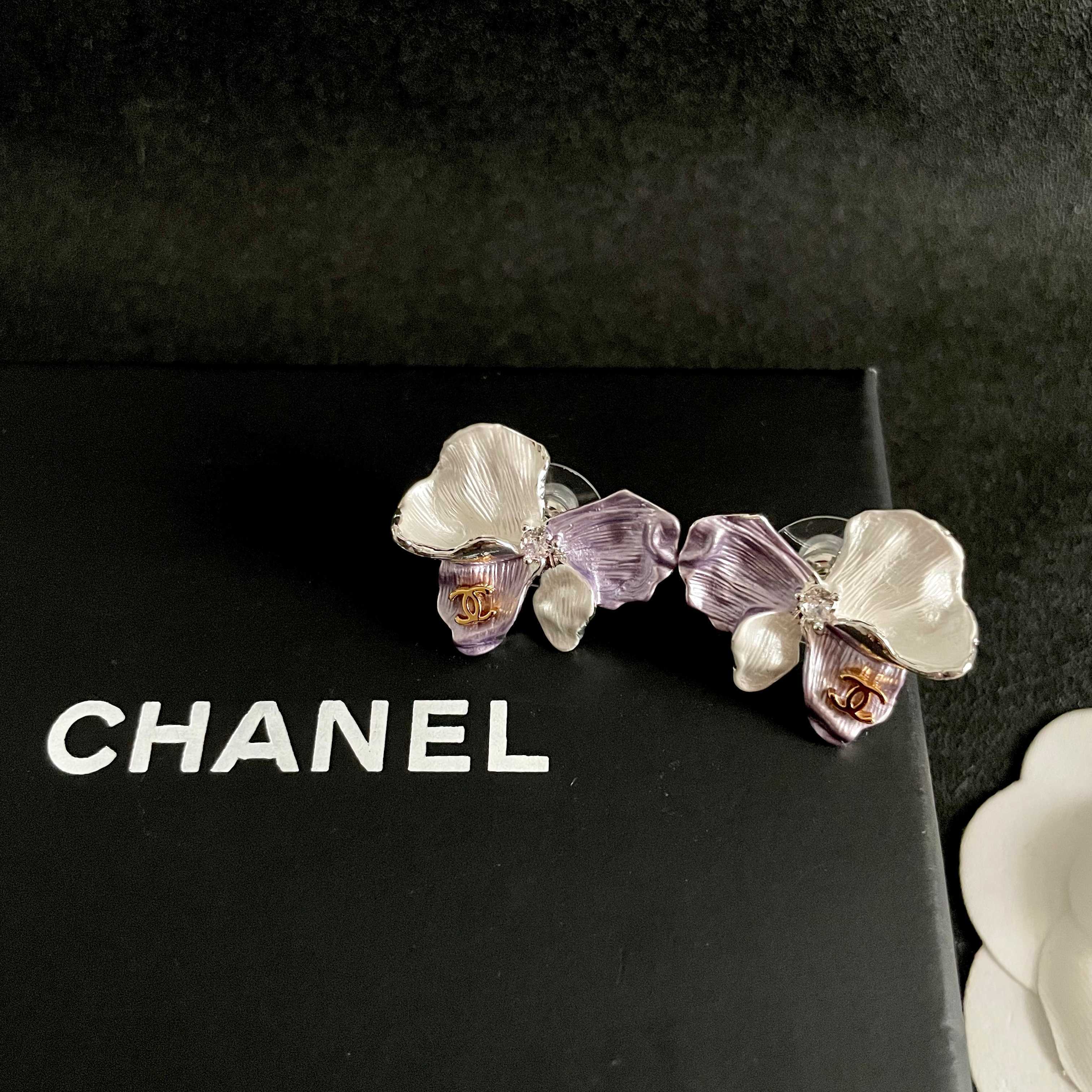 Chanel CC Logo Iridescent Flower Stud Earrings earrings Silver-toned metal pearlescent white lavender purple rose gold CC logo clear crystal accent white pearl accent 2cm stud diameter