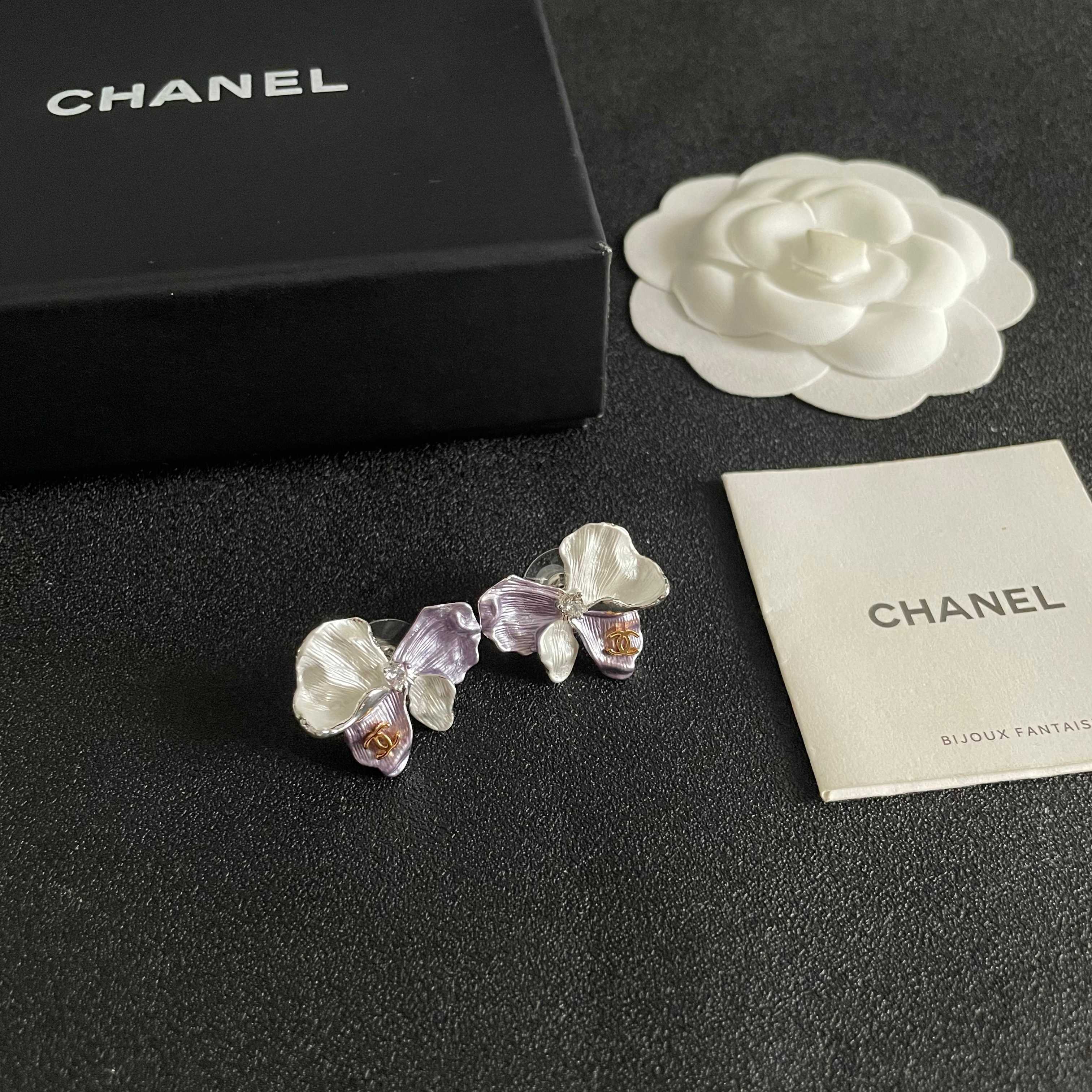Chanel CC Logo Iridescent Flower Stud Earrings earrings Silver-toned metal pearlescent white lavender purple rose gold CC logo clear crystal accent white pearl accent 2cm stud diameter