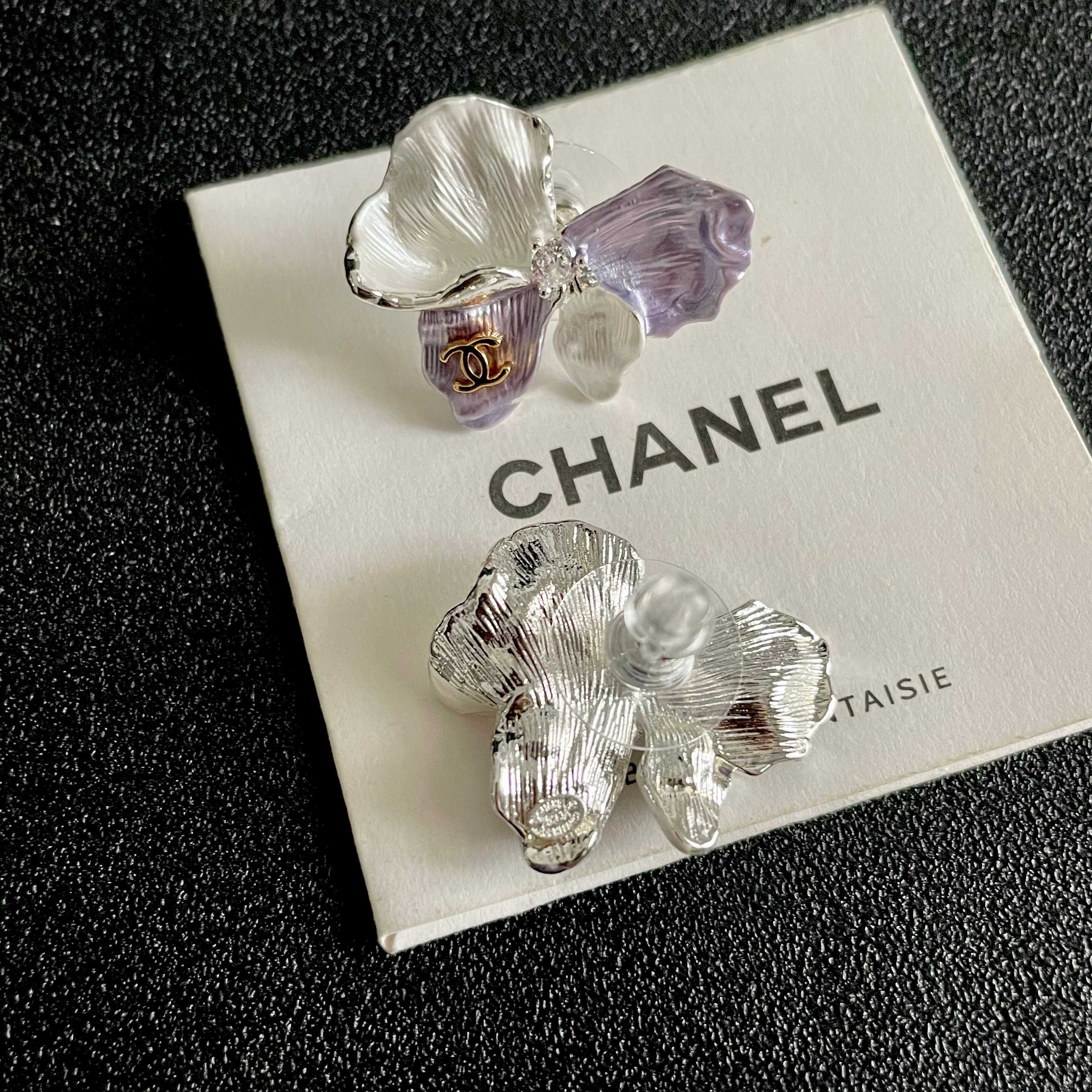 Chanel CC Logo Iridescent Flower Stud Earrings earrings Silver-toned metal pearlescent white lavender purple rose gold CC logo clear crystal accent white pearl accent 2cm stud diameter