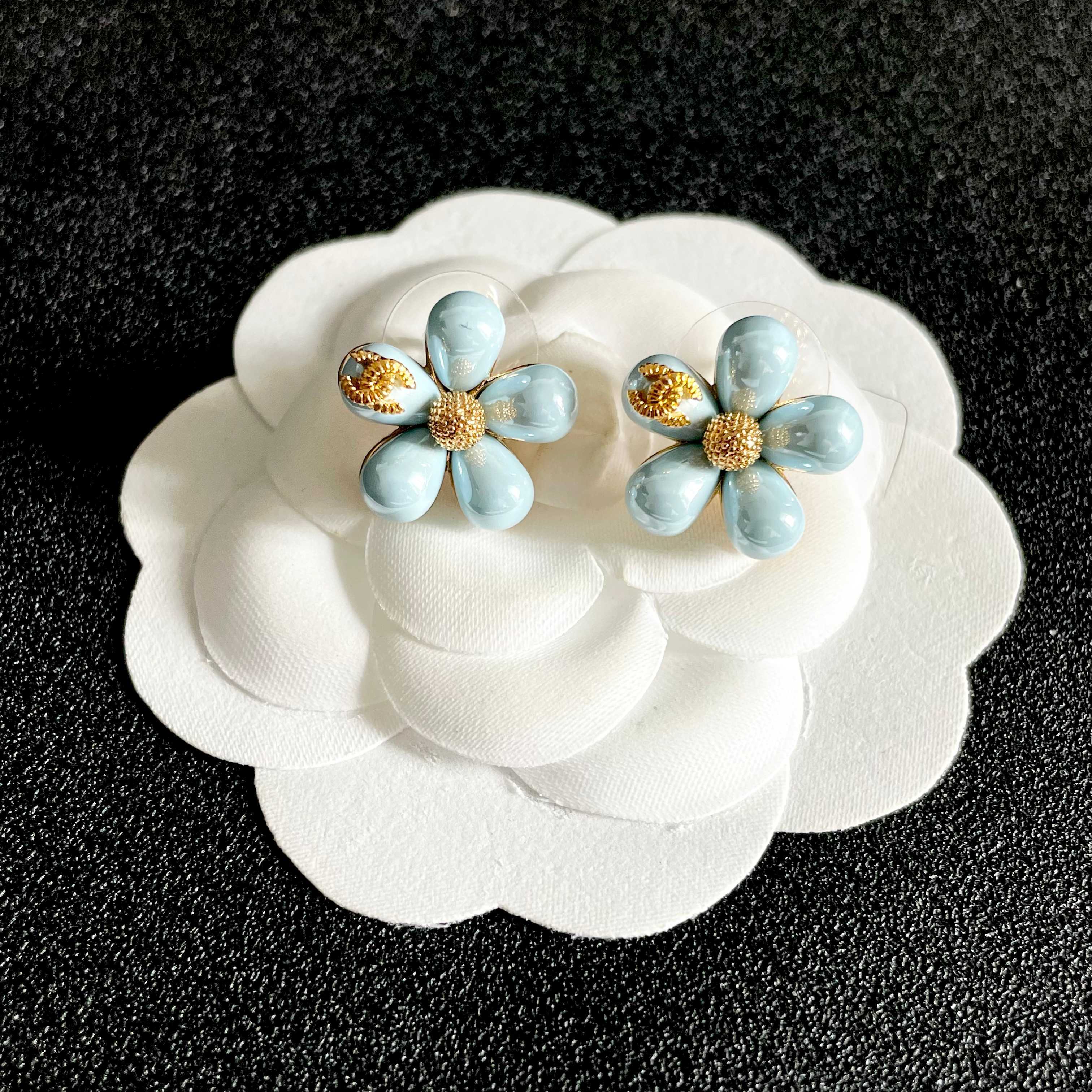 Chanel CC Logo Flower Stud Earrings earrings Gold-tone metal with light sky blue enamel 1 5cm diameter