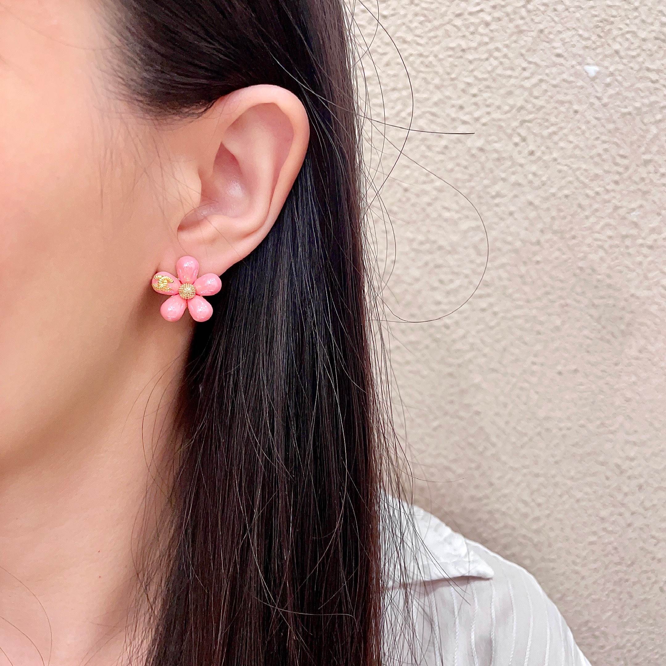 Chanel CC Flower Stud Earrings earrings Gold-tone metal with pastel pink and light blue resin flower accents 1 5cm diameter