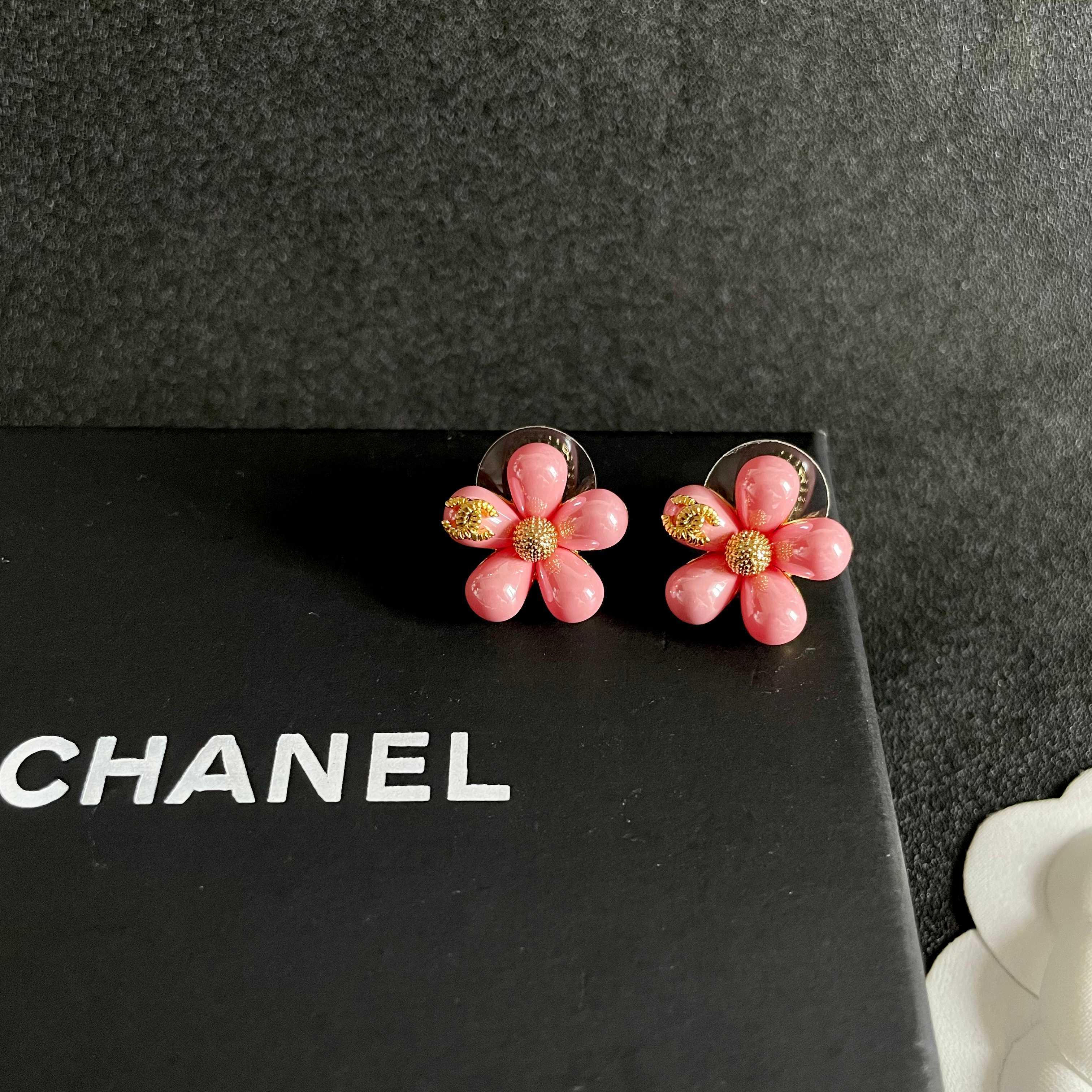 Chanel CC Flower Stud Earrings earrings Gold-tone metal with pastel pink and light blue resin flower accents 1 5cm diameter