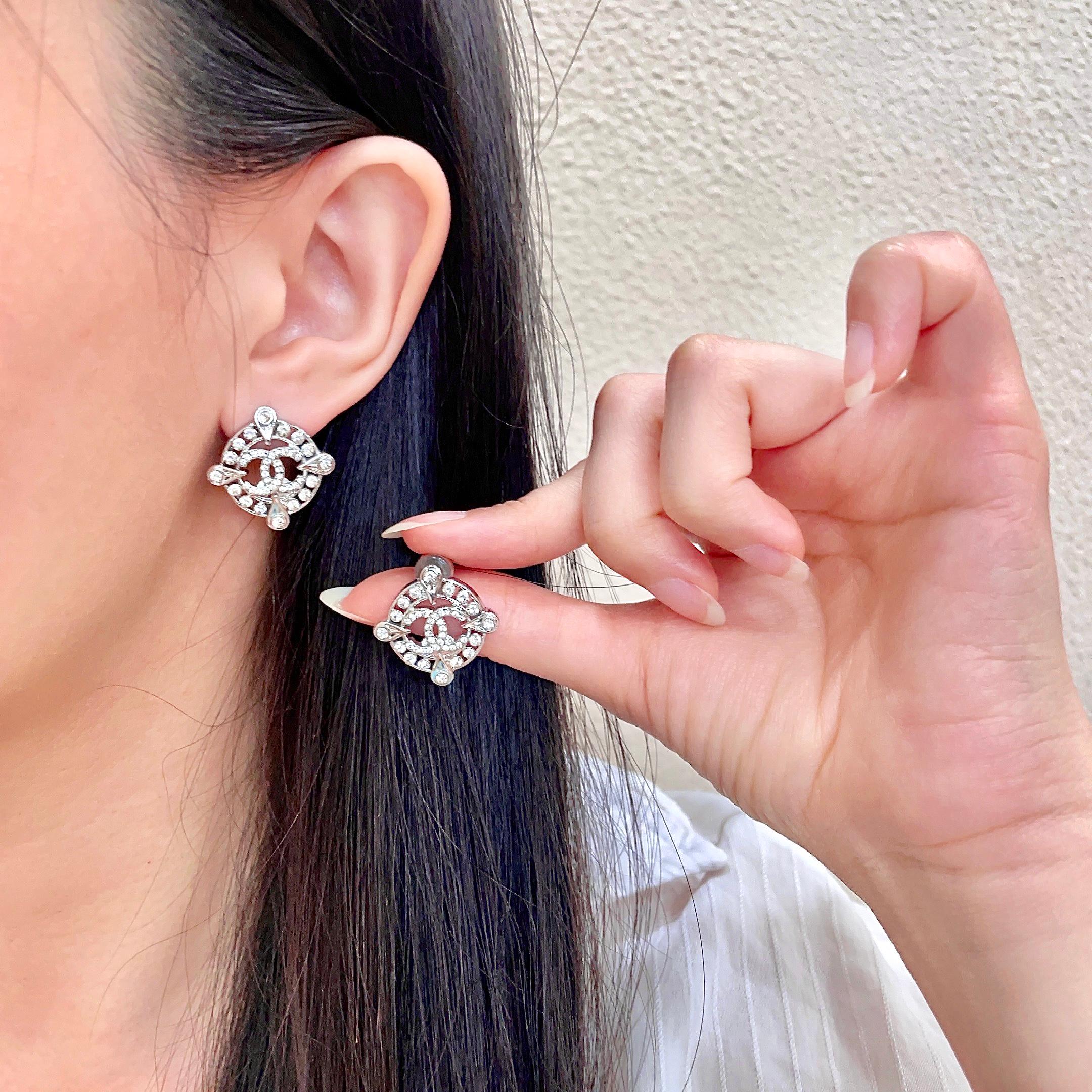 Chanel CC Logo Crystal Compass Stud Earrings earrings silver-toned metal with clear crystal accents 1 5cm diameter