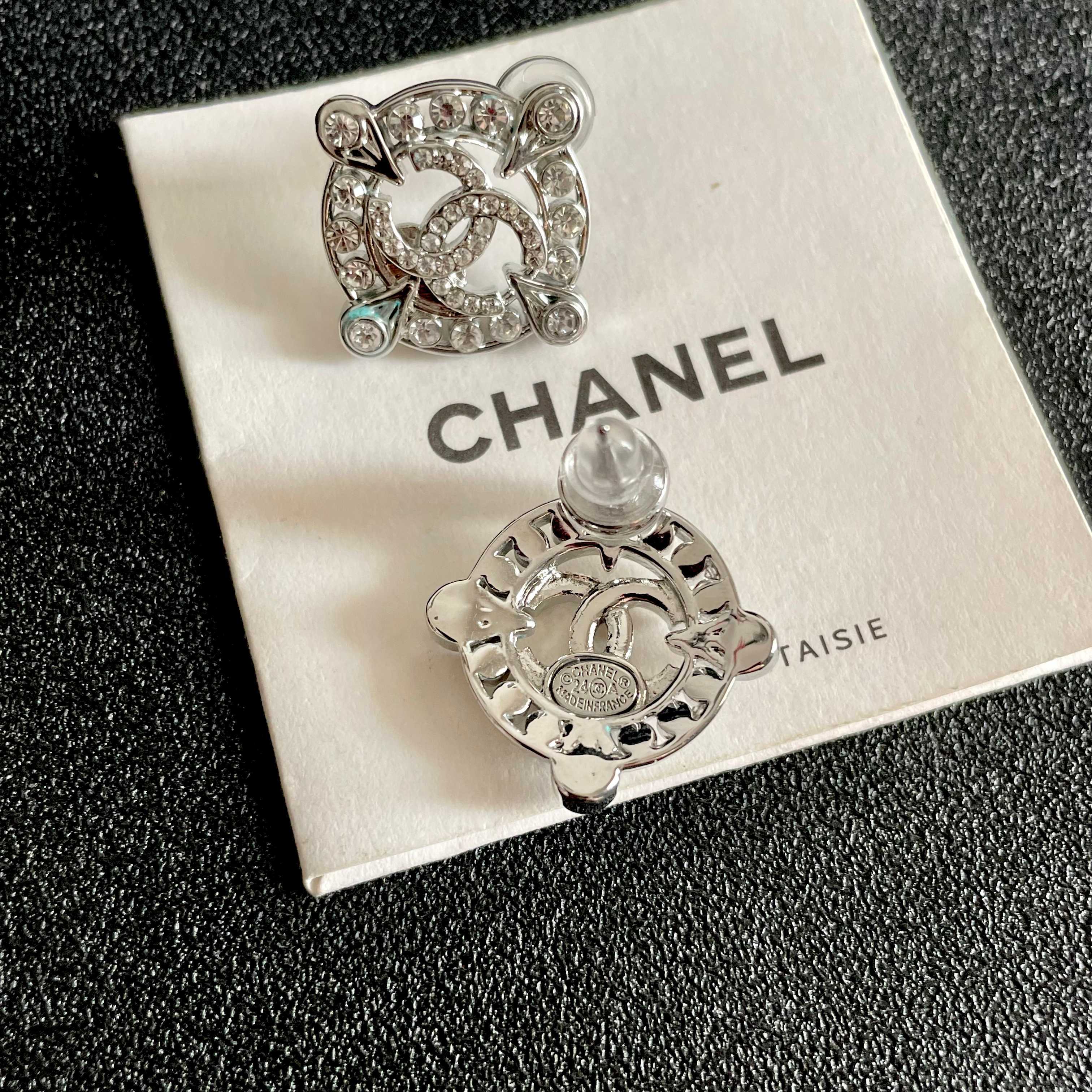 Chanel CC Logo Crystal Compass Stud Earrings earrings silver-toned metal with clear crystal accents 1 5cm diameter