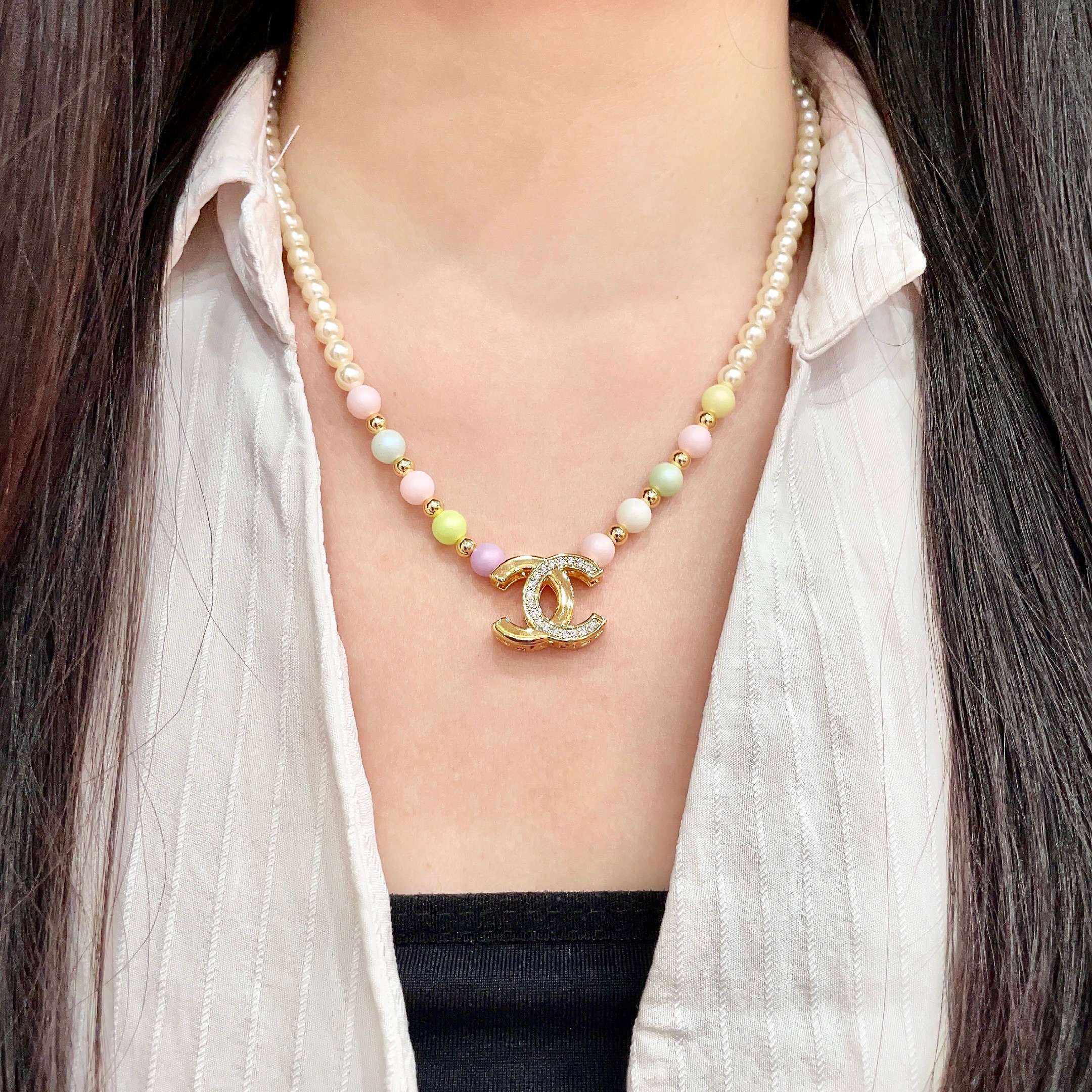 Chanel CC Logo Pastel Pearl Necklace necklace Gold-tone metal cream faux pearls pastel multicolor faux pearls clear crystal accents 42cm