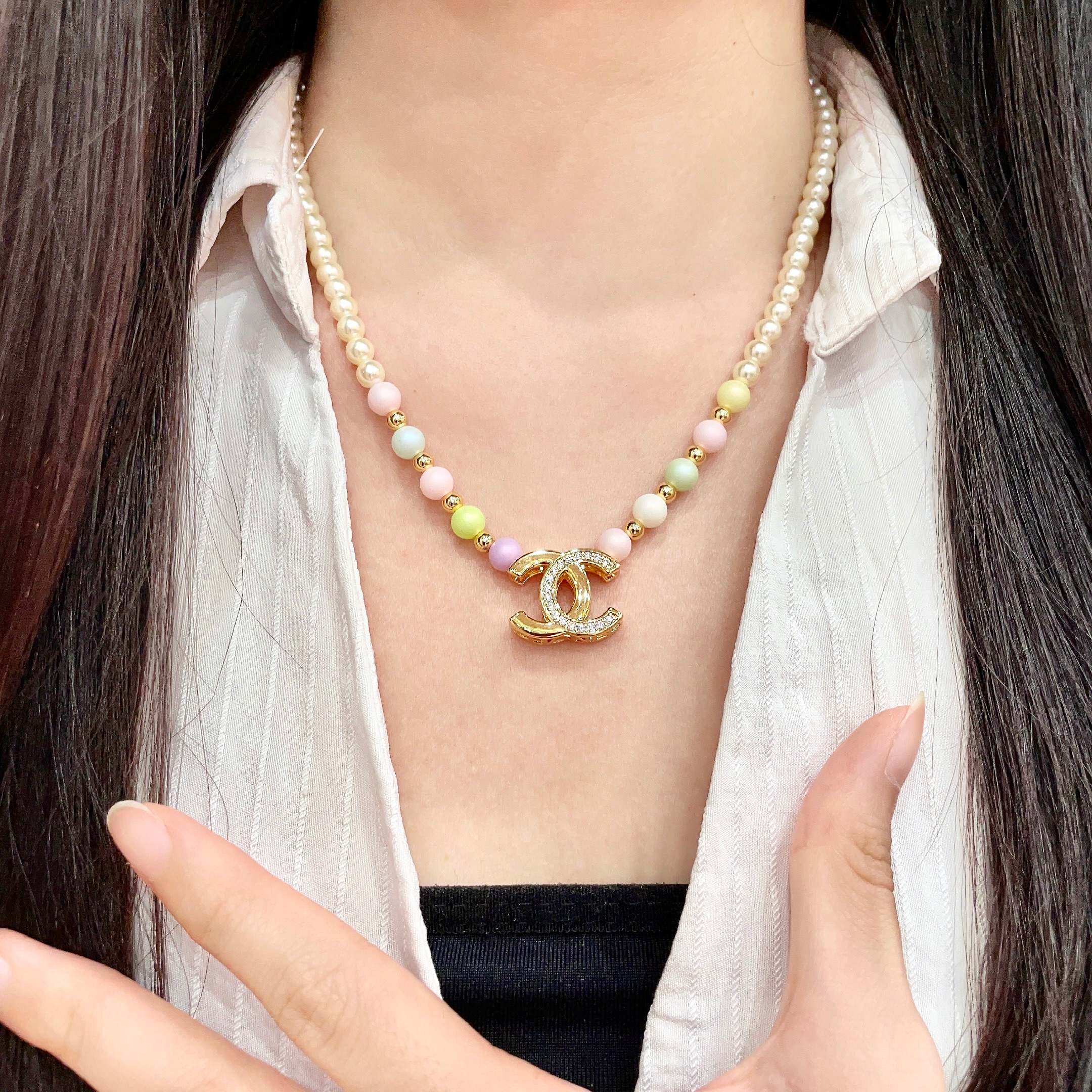 Chanel CC Logo Pastel Pearl Necklace necklace Gold-tone metal cream faux pearls pastel multicolor faux pearls clear crystal accents 42cm