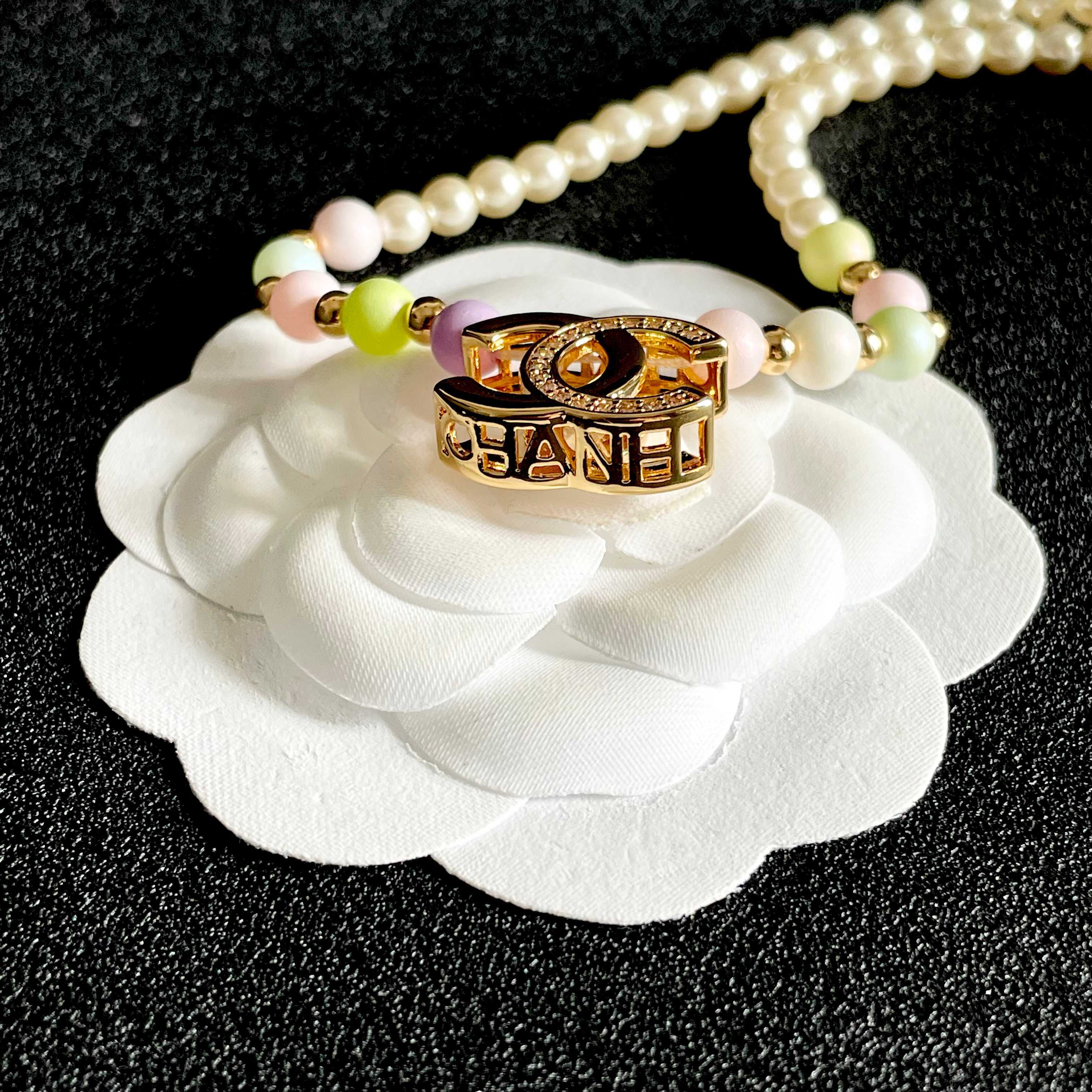 Chanel CC Logo Pastel Pearl Necklace necklace Gold-tone metal cream faux pearls pastel multicolor faux pearls clear crystal accents 42cm
