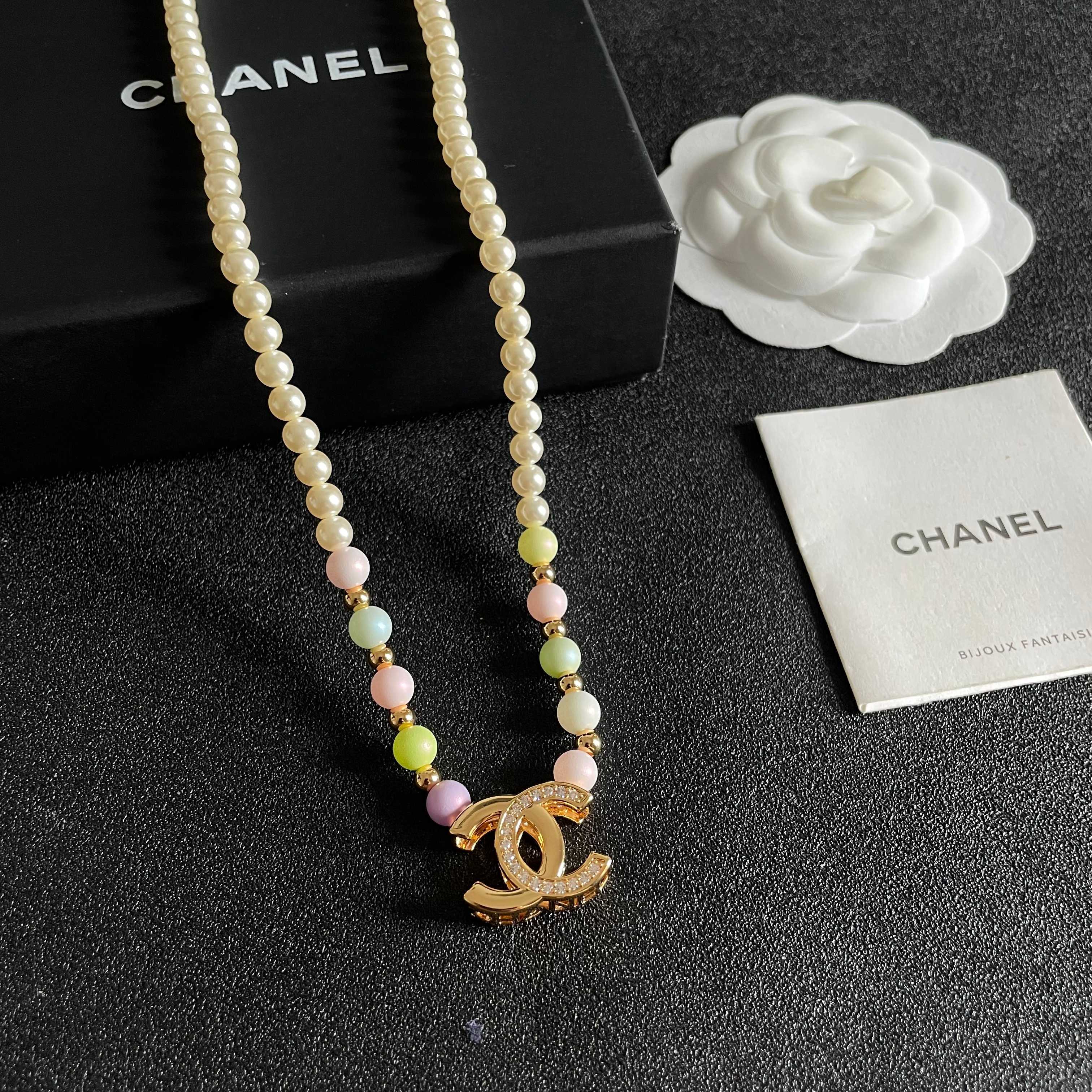 Chanel CC Logo Pastel Pearl Necklace necklace Gold-tone metal cream faux pearls pastel multicolor faux pearls clear crystal accents 42cm