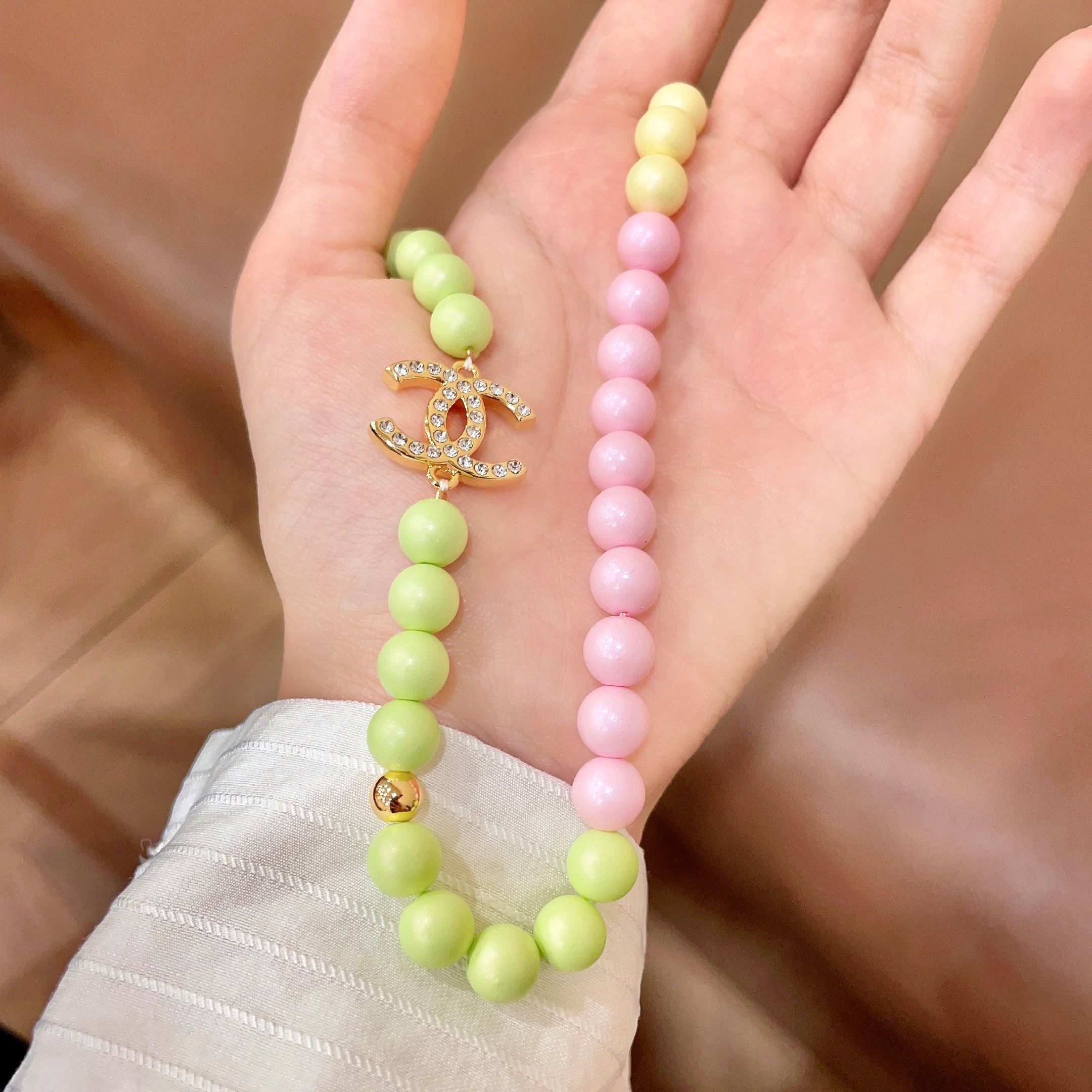 Chanel CC Logo Pastel Beaded Necklace necklace Gold-tone metal with clear crystals pastel mint green light blue pale yellow and pink beads 42cm