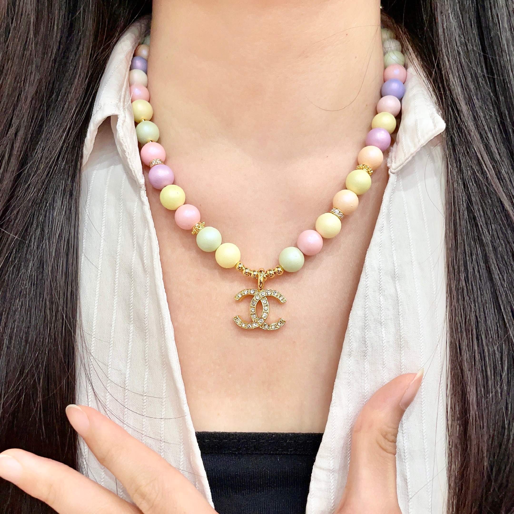 Chanel CC Logo Pastel Bead Necklace necklace Gold-tone metal with clear crystal accents pastel multicolor beads pink yellow mint green lavender peach cream 42cm with 5cm extender chain