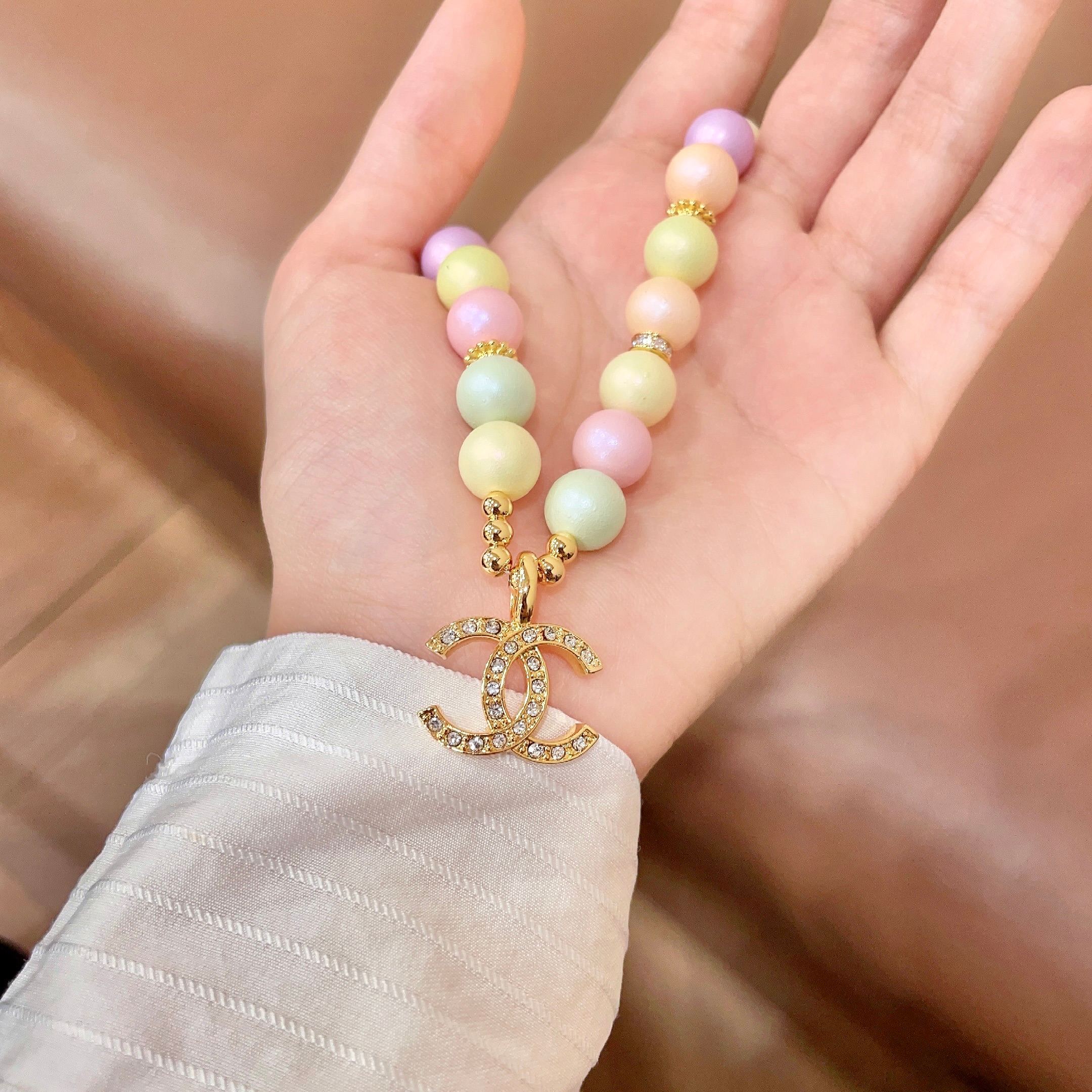 Chanel CC Logo Pastel Bead Necklace necklace Gold-tone metal with clear crystal accents pastel multicolor beads pink yellow mint green lavender peach cream 42cm with 5cm extender chain