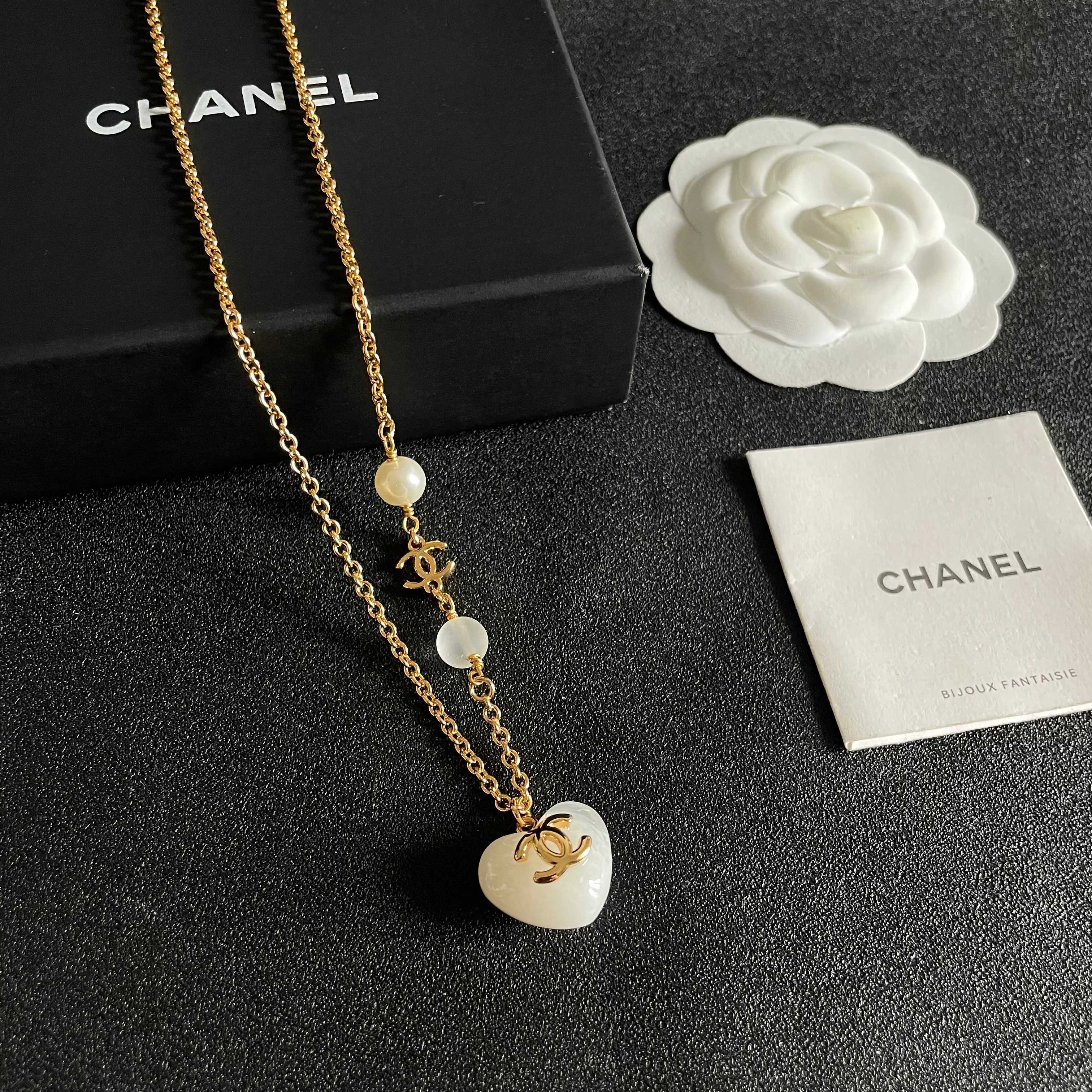 Chanel CC Heart Pendant necklace Gold-tone metal white resin heart white faux pearl frosted white bead 42cm