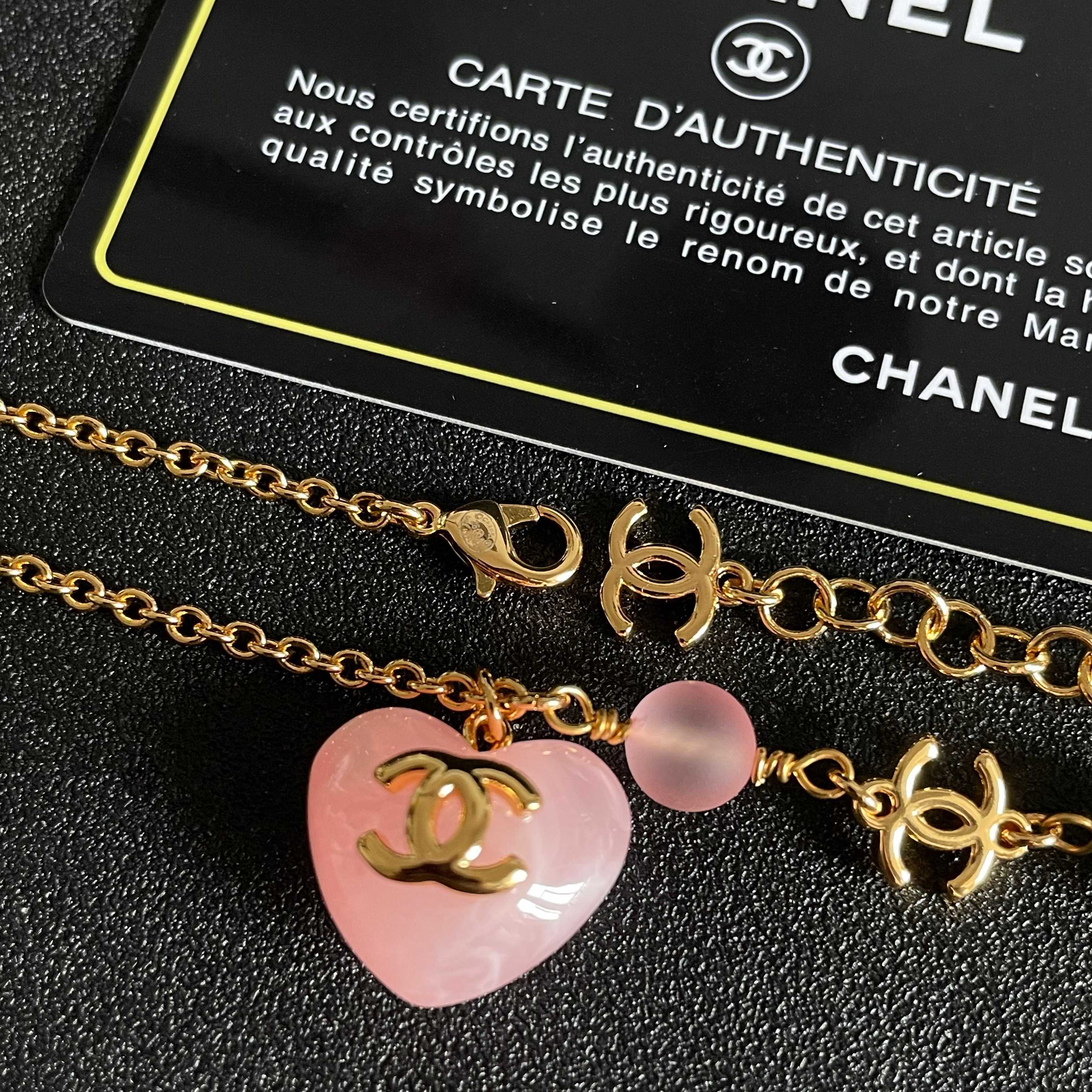 Chanel CC Heart Pendant Necklace necklace Gold-tone metal with cream faux pearl pink resin bead and pink resin heart pendant 42cm