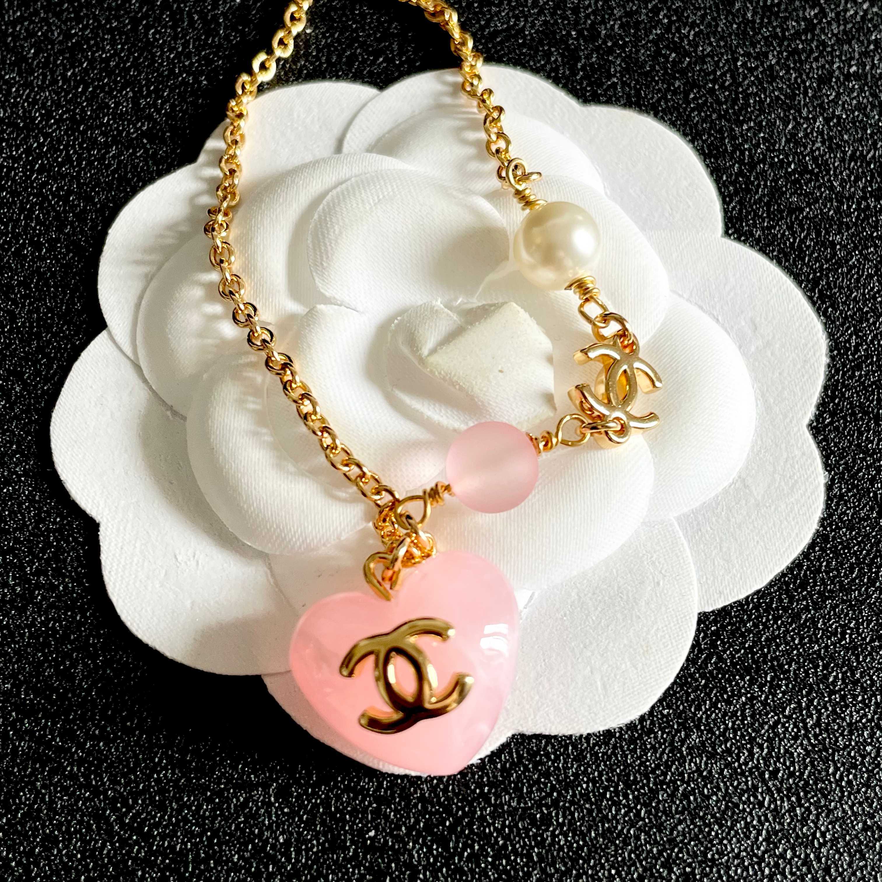 Chanel CC Heart Pendant Necklace necklace Gold-tone metal with cream faux pearl pink resin bead and pink resin heart pendant 42cm