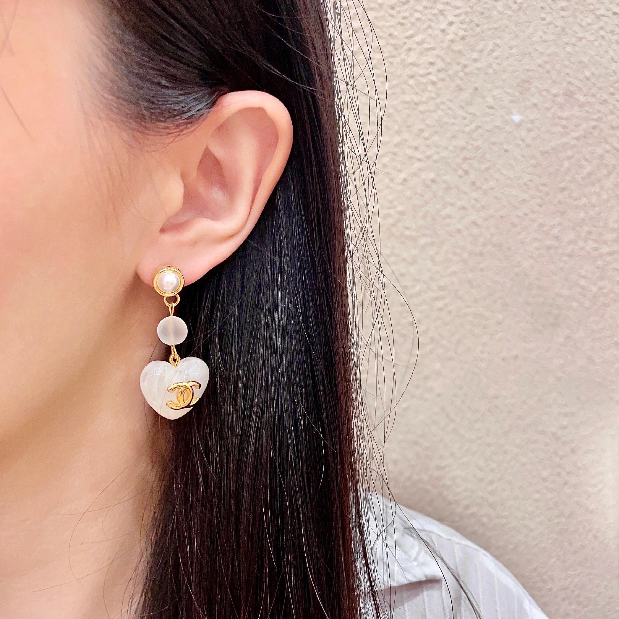 Chanel CC Heart Drop Earrings earrings gold-tone metal white mother-of-pearl effect resin white pearl accent 3 5cm drop length