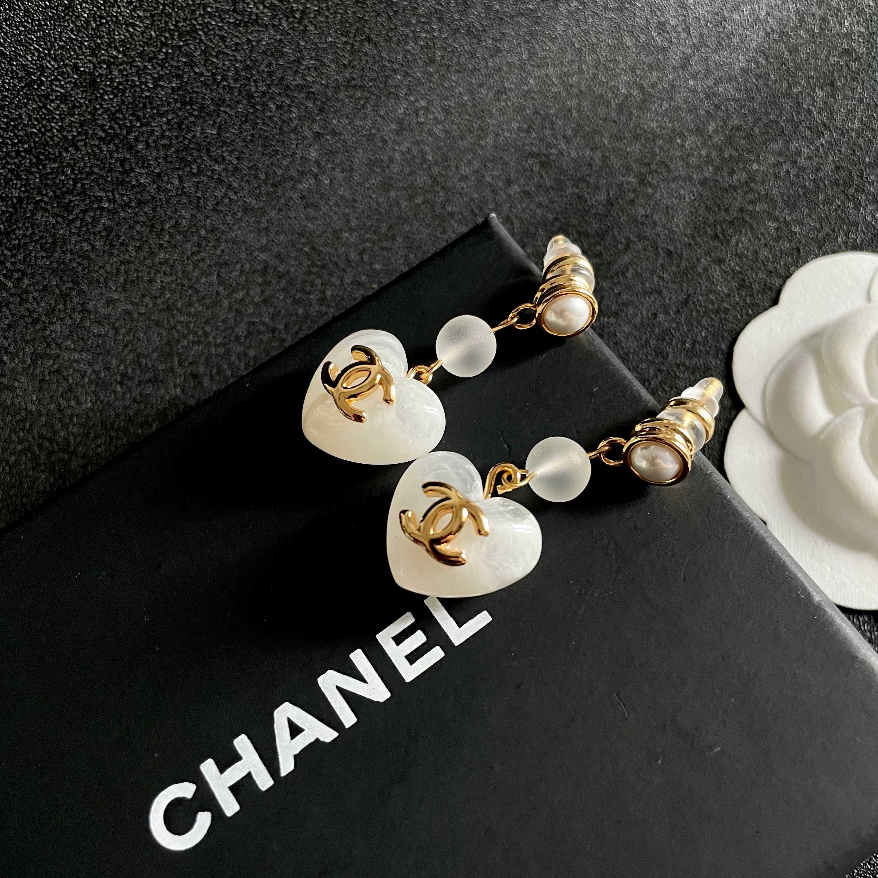 Chanel CC Heart Drop Earrings earrings gold-tone metal white mother-of-pearl effect resin white pearl accent 3 5cm drop length