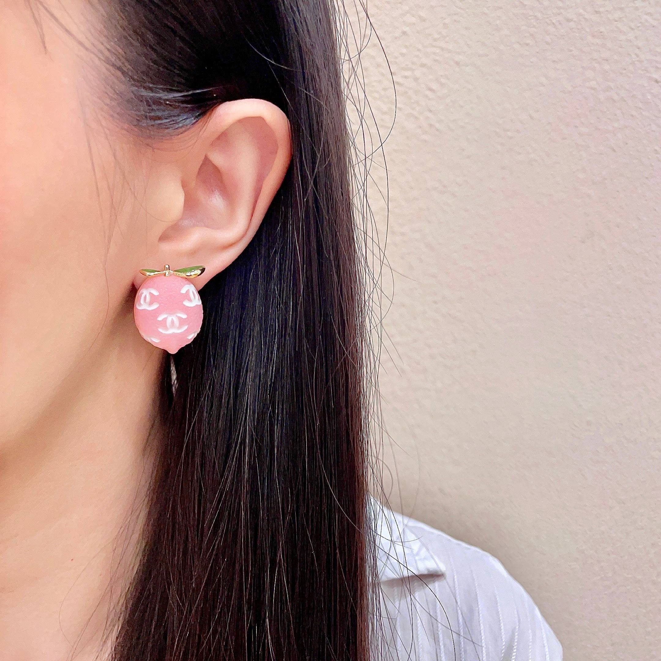 Chanel CC Lemon Fruit Stud Earrings earrings Gold-tone metal pink resin with white interlocking CC logos green enamel leaf accents One Size approx 2cm drop length