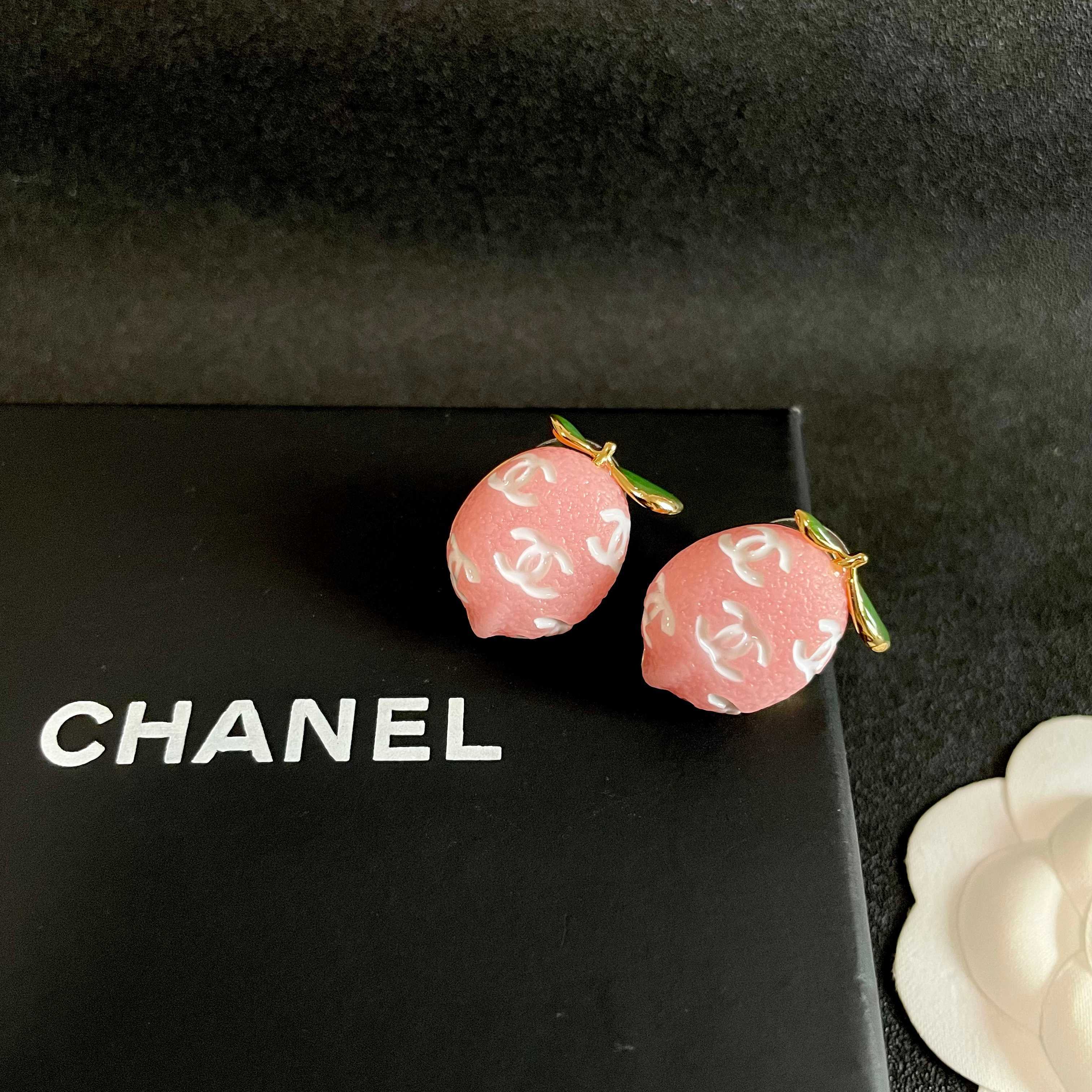 Chanel CC Lemon Fruit Stud Earrings earrings Gold-tone metal pink resin with white interlocking CC logos green enamel leaf accents One Size approx 2cm drop length