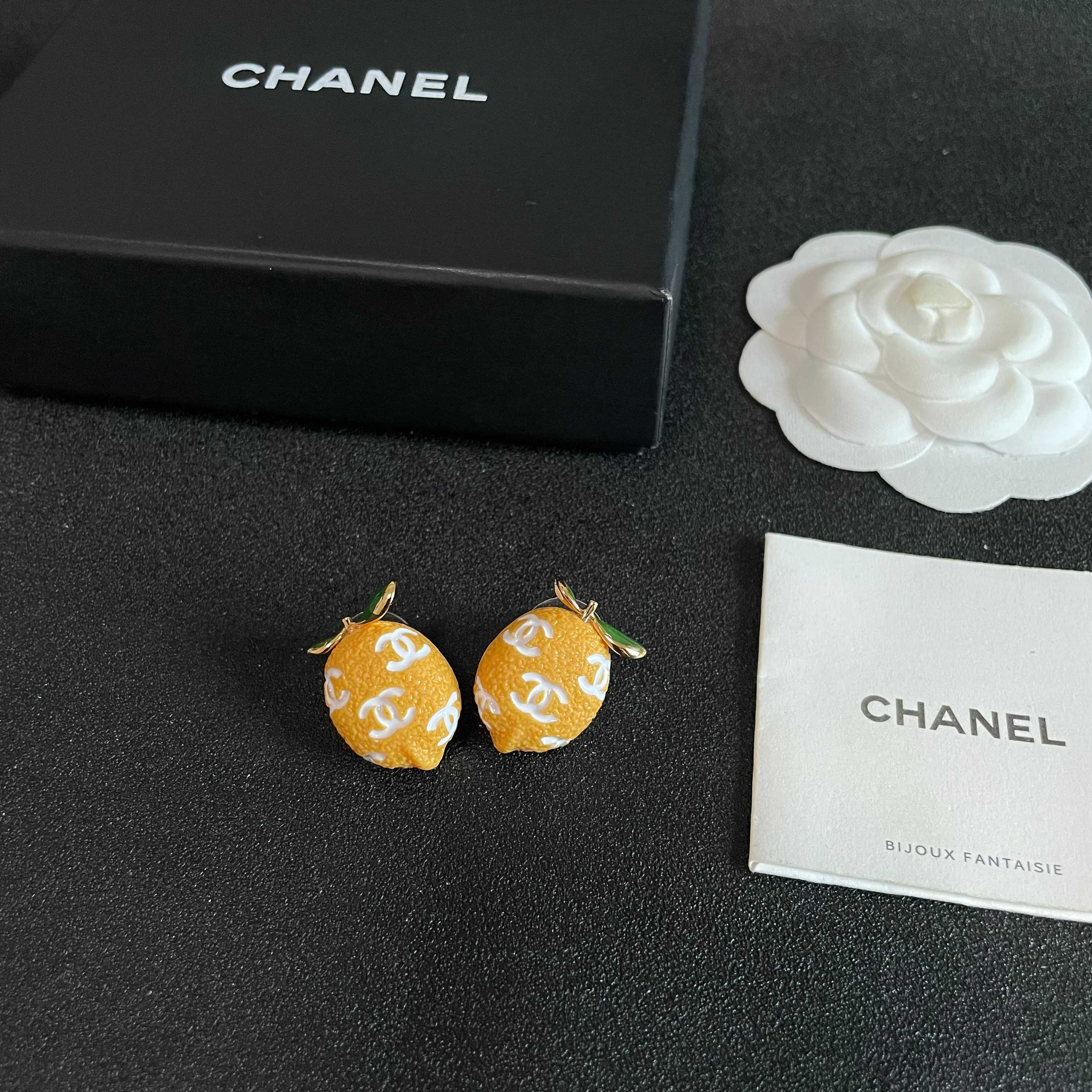 Chanel CC Lemon Fruit Stud Earrings earrings Gold tone metal yellow enamel lemon body white enamel CC logos green enamel leaves 1 5cm stud diameter