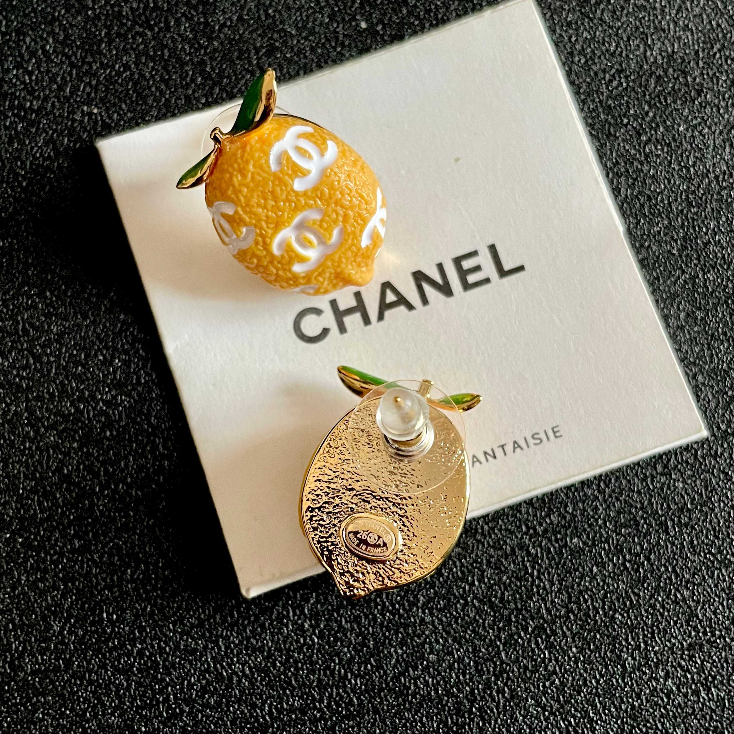 Chanel CC Lemon Fruit Stud Earrings earrings Gold tone metal yellow enamel lemon body white enamel CC logos green enamel leaves 1 5cm stud diameter
