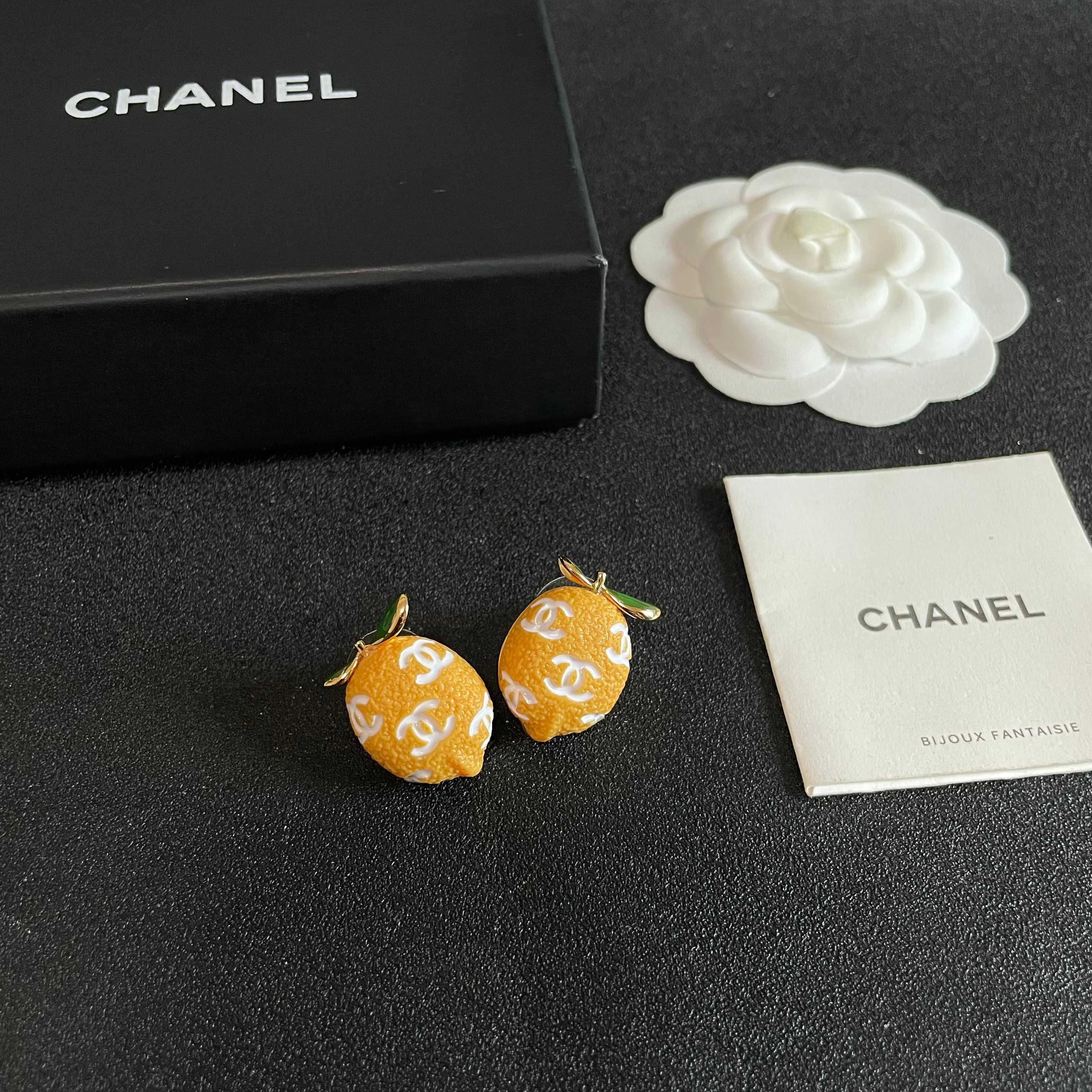 Chanel CC Lemon Fruit Stud Earrings earrings Gold tone metal yellow enamel lemon body white enamel CC logos green enamel leaves 1 5cm stud diameter