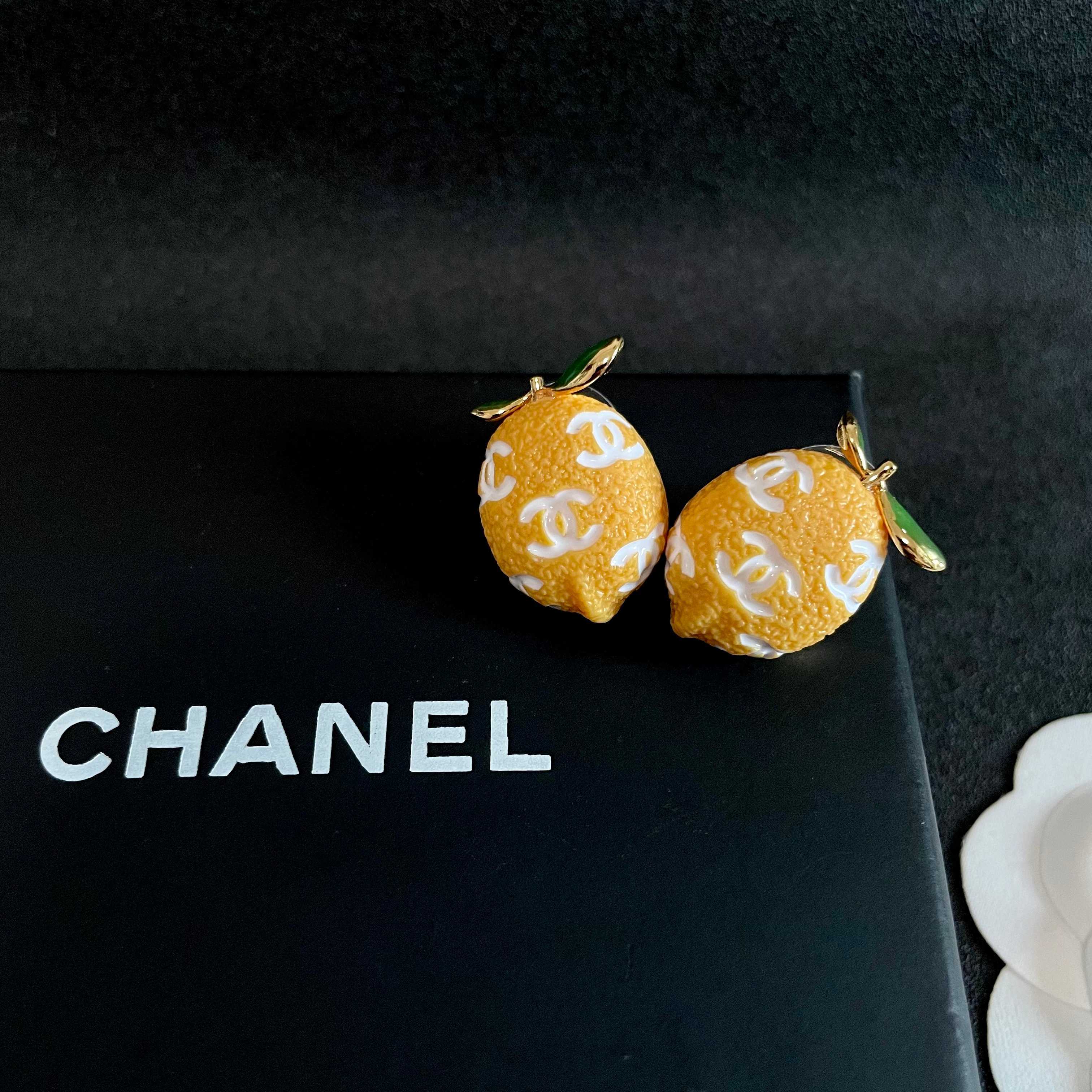 Chanel CC Lemon Fruit Stud Earrings earrings Gold tone metal yellow enamel lemon body white enamel CC logos green enamel leaves 1 5cm stud diameter