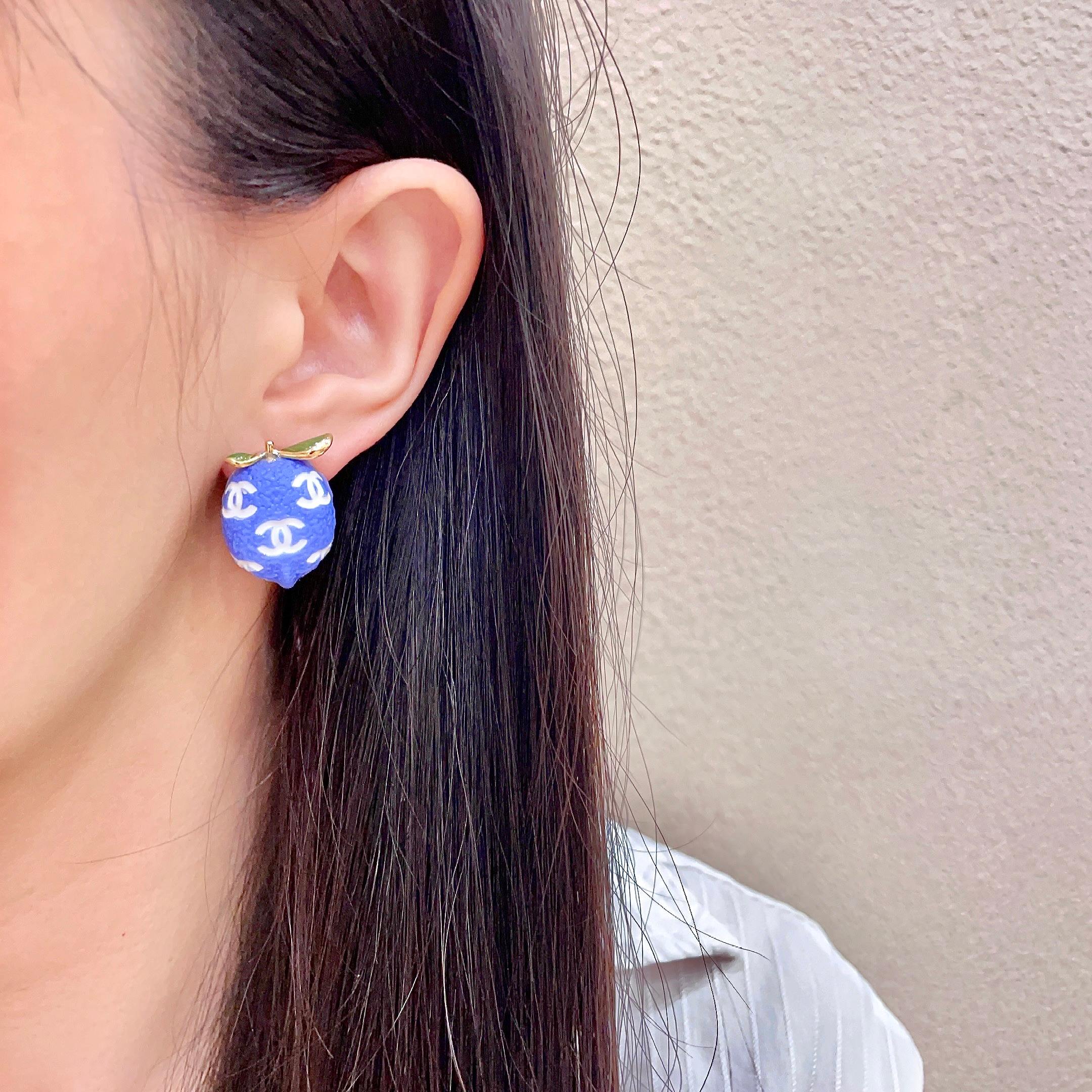 Chanel CC Lemon Stud Earrings earrings Gold-tone metal with blue enamel white interlocking CC logos green enamel leaf accents One Size