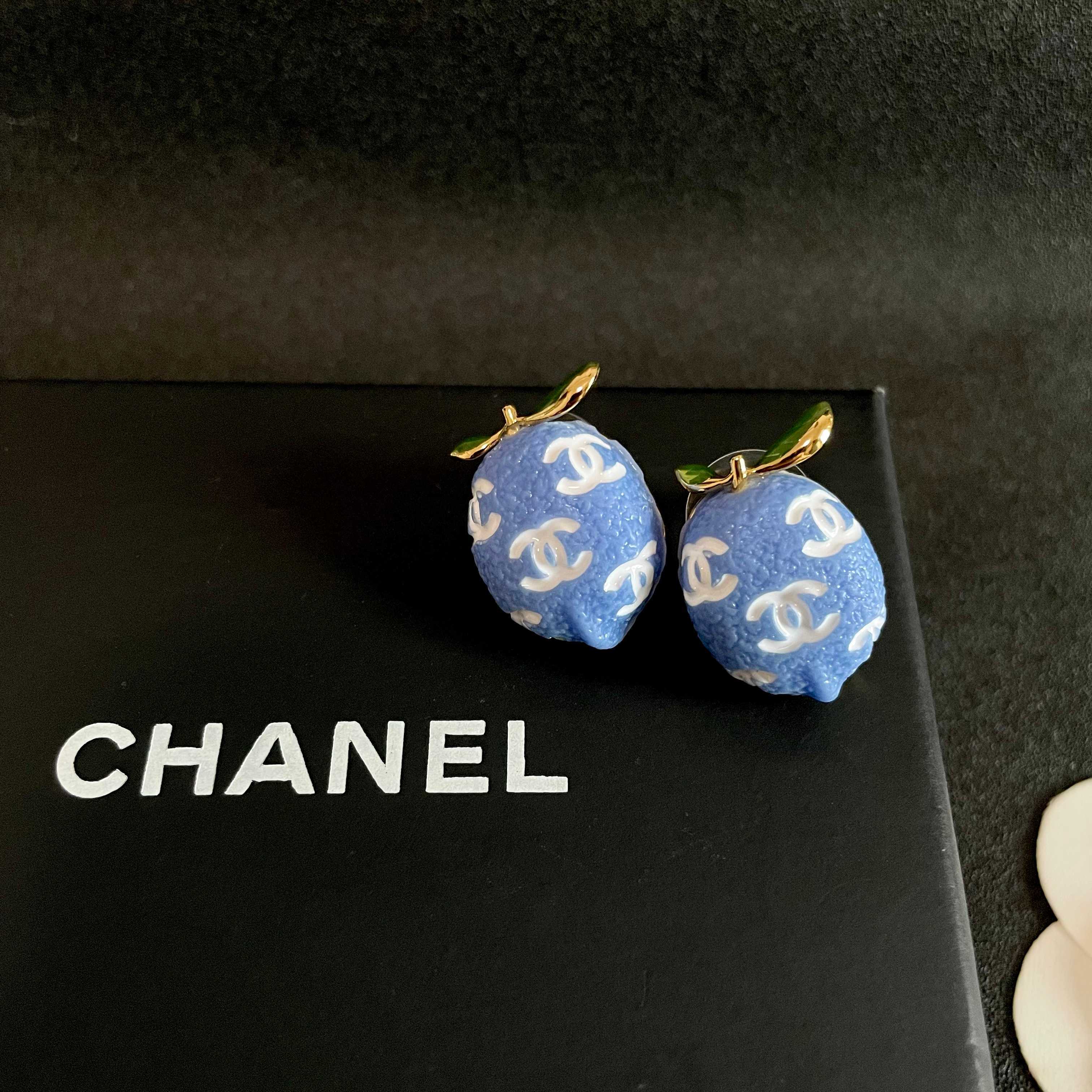 Chanel CC Lemon Stud Earrings earrings Gold-tone metal with blue enamel white interlocking CC logos green enamel leaf accents One Size
