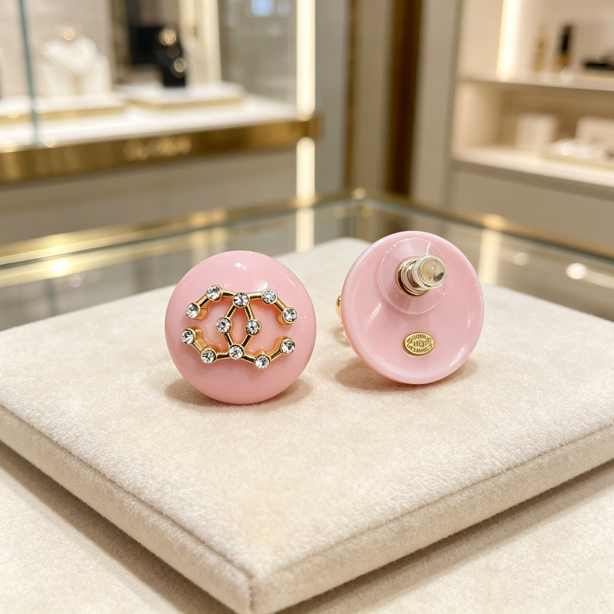 Chanel CC Logo Round Resin Stud Earrings earrings Pink resin base gold-tone metal interlocking CC logo with clear crystal accents 3cm diameter