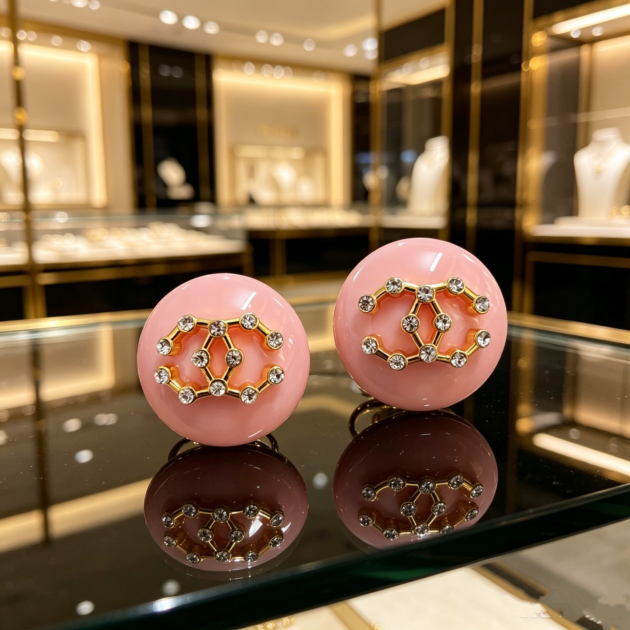 Chanel CC Logo Round Resin Stud Earrings earrings Pink resin base gold-tone metal interlocking CC logo with clear crystal accents 3cm diameter