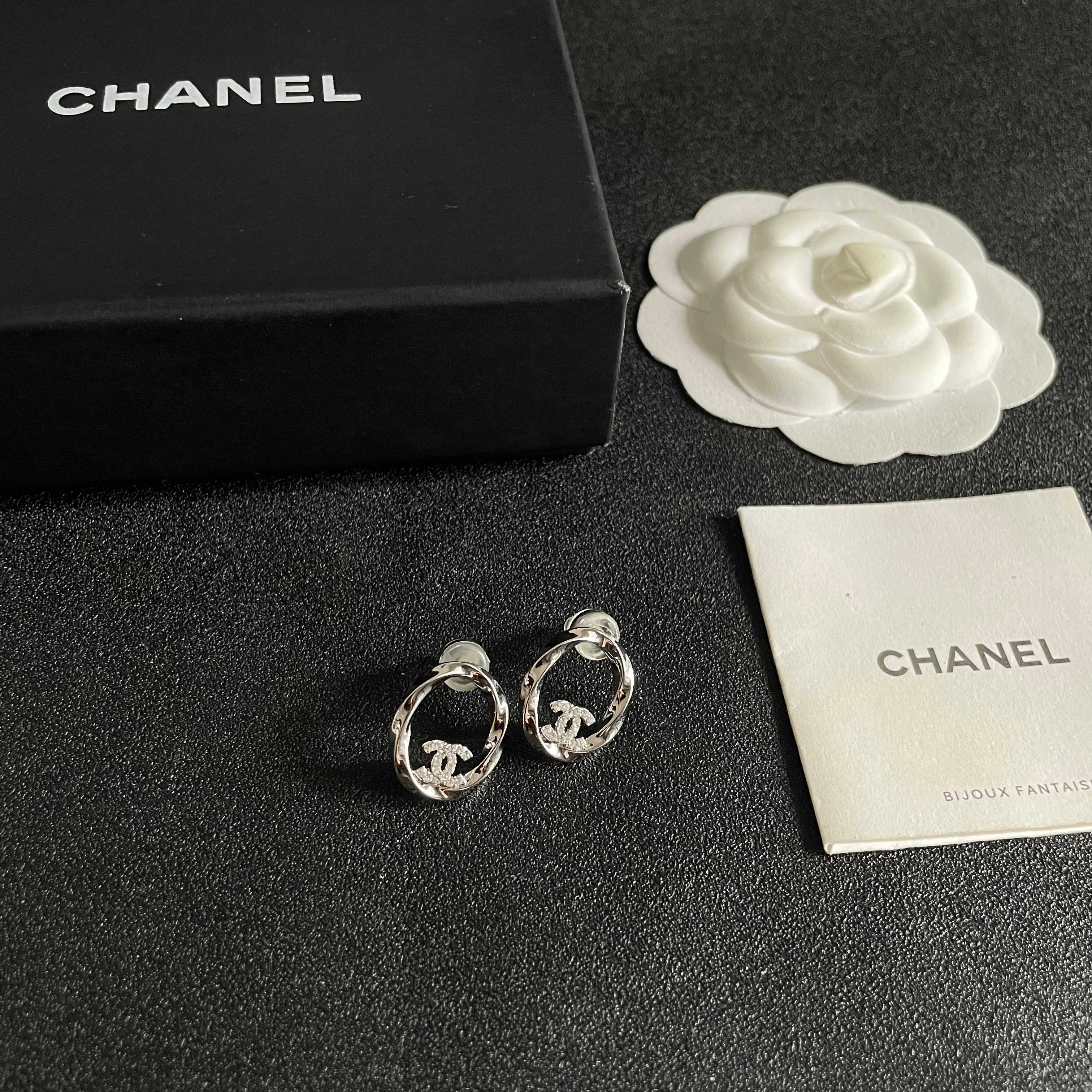 Chanel CC Twisted Open Hoop Earrings earrings silver-toned metal with clear crystal accents 1 5cm diameter