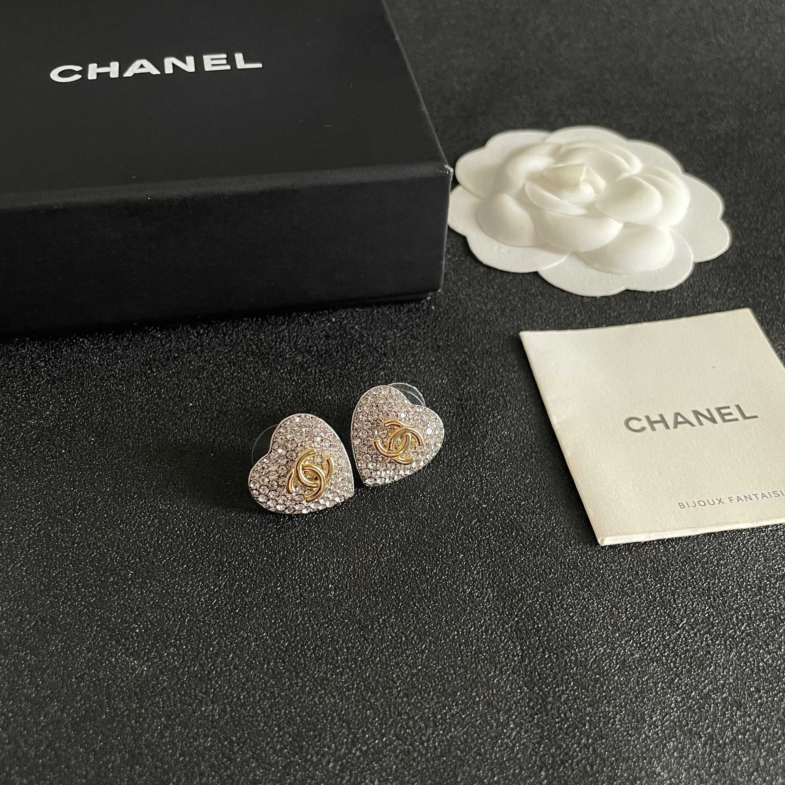 Chanel CC Heart Crystal Stud Earrings earrings silver-tone metal base gold-tone interlocking CC logo clear crystal pave 1 5cm diameter